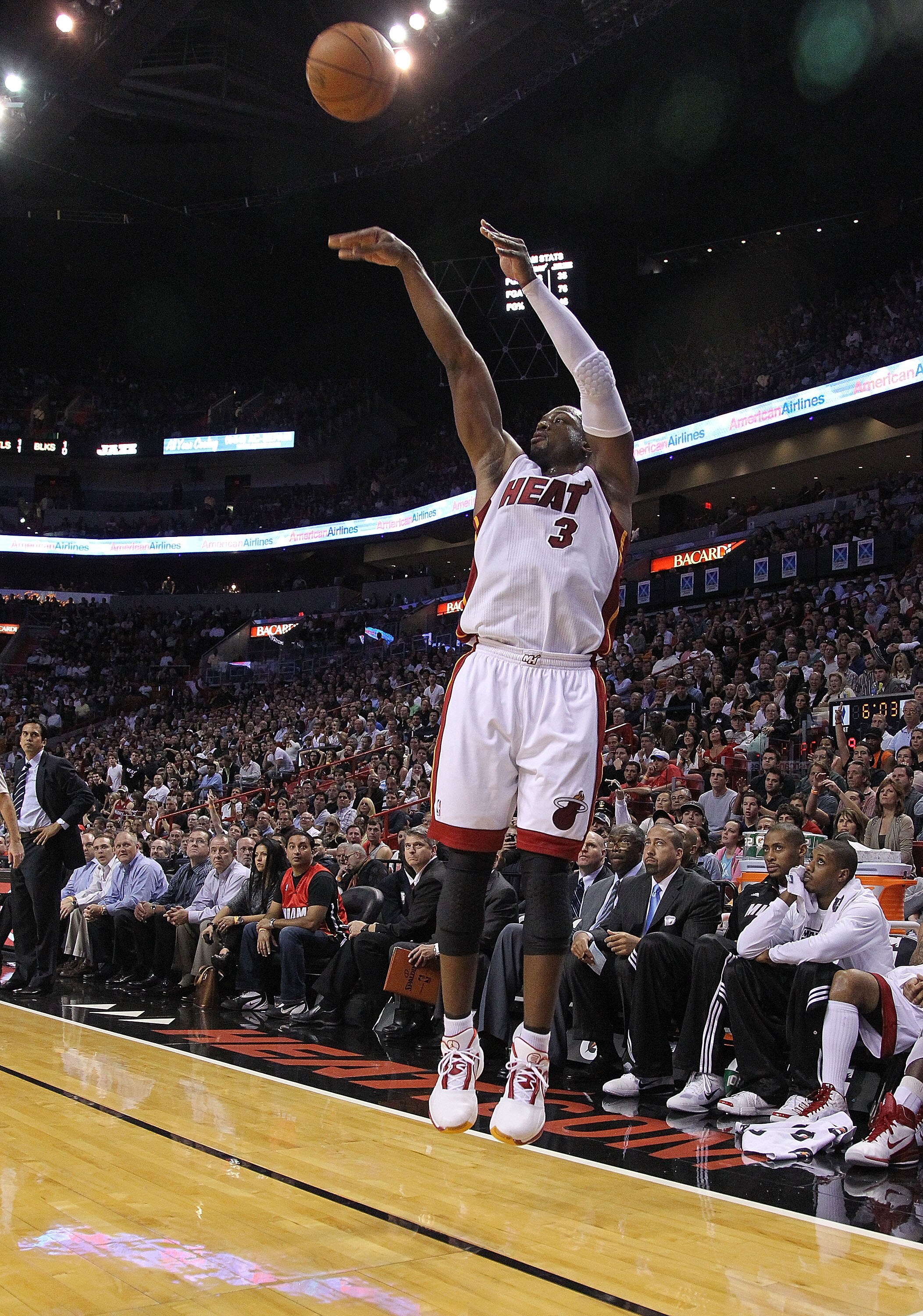 MIAMI - NOVEMBER 09:  Dwayne Wade #3  of the Miami Heat shoots during a game against the Utah Jazz at American Airlines Arena on November 9, 2010 in Miami, Florida. NOTE TO USER: User expressly acknowledges and agrees that, by downloading and/or using thi
