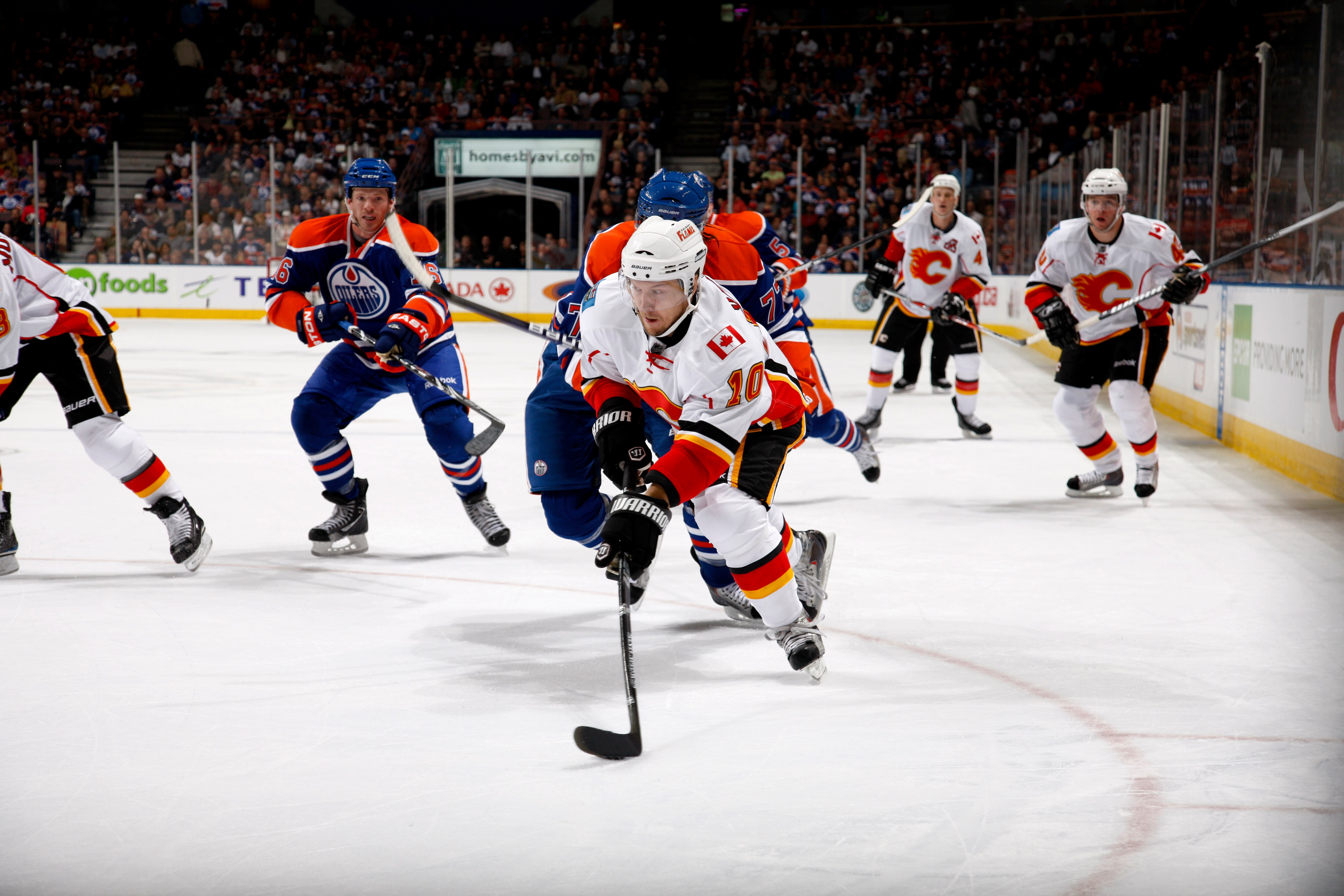 EDMONTON, CANADA - OCTOBER 7: Niklas Hagman #10 of the Calgary Flames drives to the net against the Edmonton Oilers in first-period action at Rexall Place October 7, 2010 in Edmonton, Alberta, Canada. (Photo by Dale MacMillan/Getty Images)