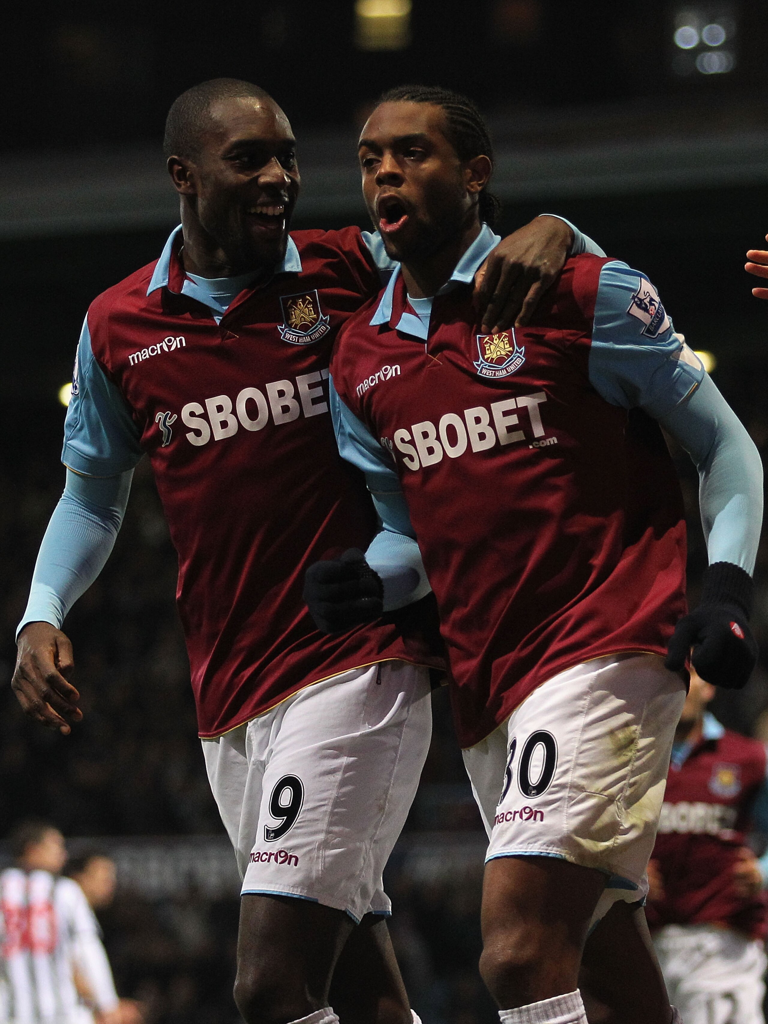LONDON, ENGLAND - NOVEMBER 10:  Frederic Piquionne (R) of West Bromwich celebrates with team mate Carlton Cole after scoring their second goal from a penalty during the Barclays Premier League match between West Ham United and West Bromwich Albion at Bole