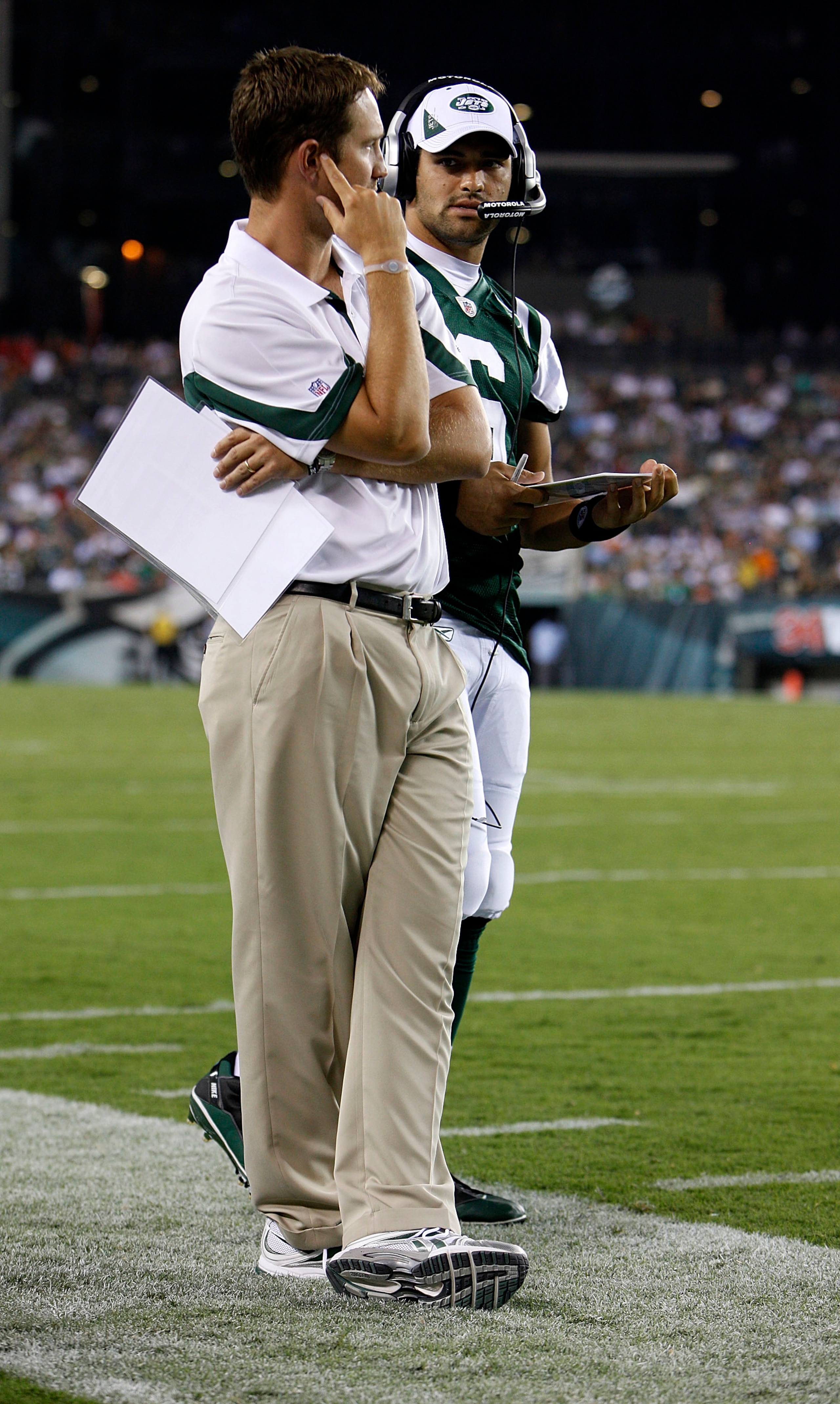 PHILADELPHIA - SEPTEMBER 02: Mark Sanchez #6 and offensive coordinator Brian Schottenheimer of the New York Jets look on during a preseason game against the Philadelphia Eagles at Lincoln Financial Field on September 2, 2010 in Philadelphia, Pennsylvania.