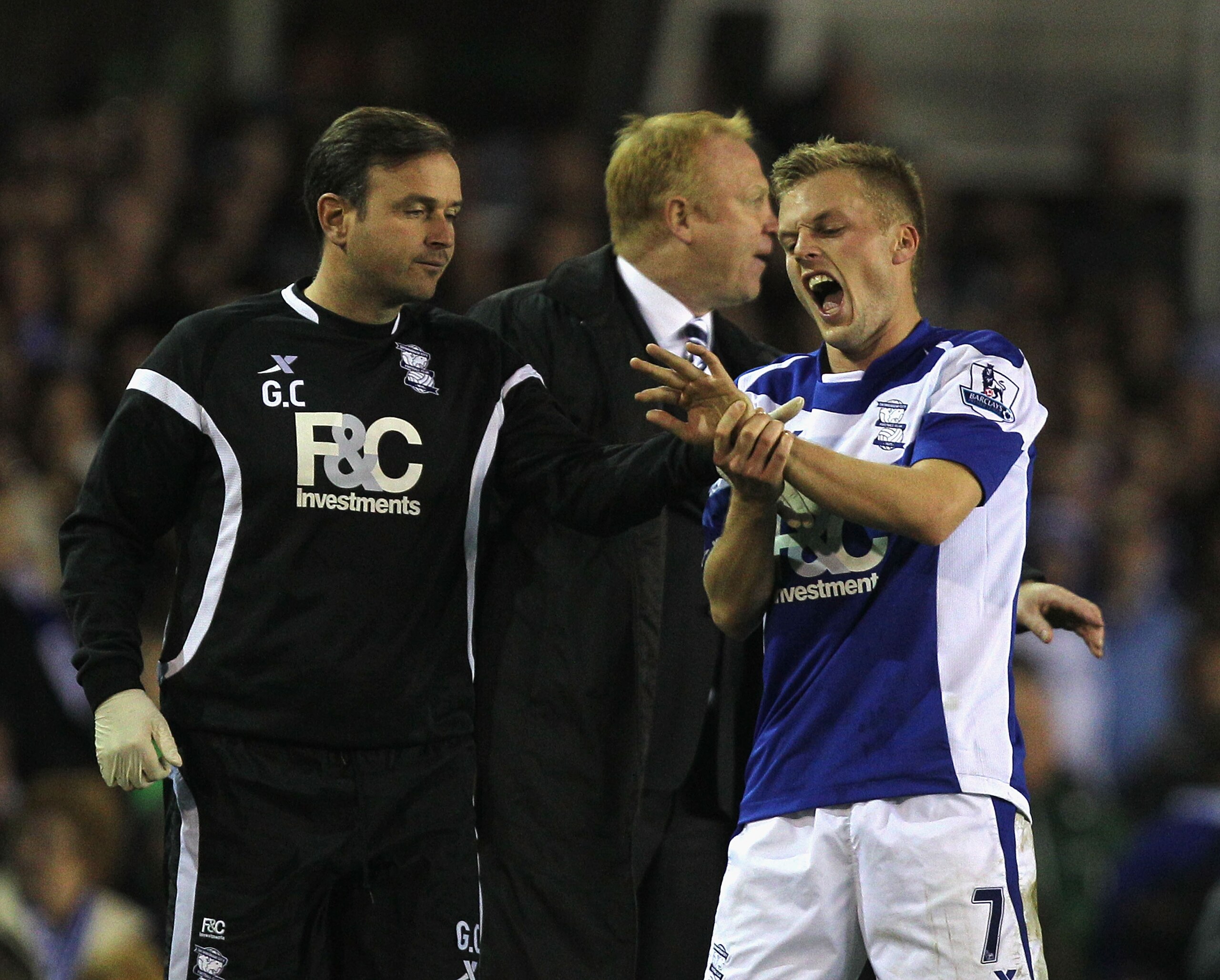 BIRMINGHAM, ENGLAND - NOVEMBER 06:  Sebastian Larsson of Birmingham receives treatment to an injured finger during the Barclays Premier League match between Birmingham City and West Ham United at St Andrews on November 6, 2010 in Birmingham, England.  (Ph