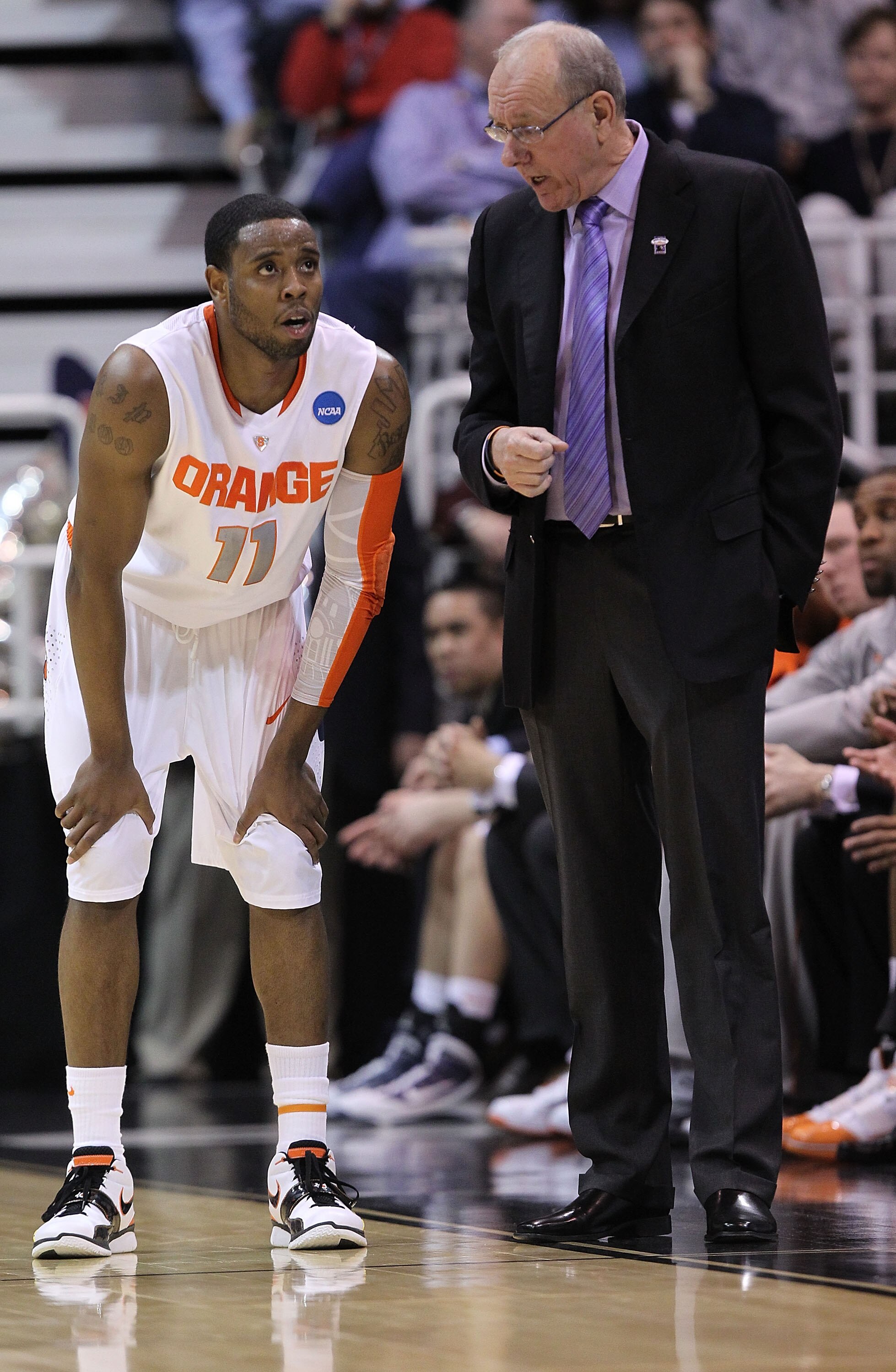 SALT LAKE CITY - MARCH 25:  Head coach Jim Boeheim of the Syracuse Orange speaks to Scoop Jardine #11 against the Butler Bulldogs during the west regional semifinal of the 2010 NCAA men's basketball tournament at the Energy Solutions Arena on March 25, 20