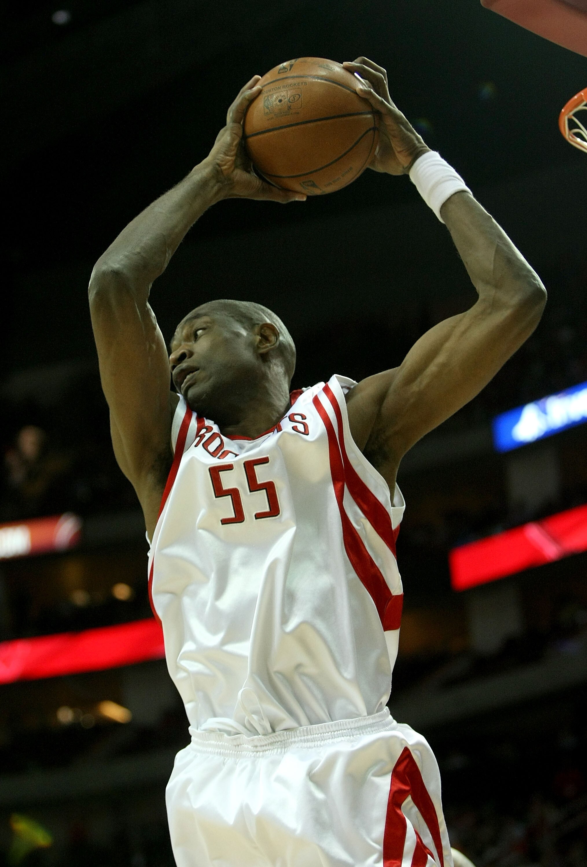 HOUSTON - APRIL 29:  Dikembe Mutombo #55 of the Houston Rockets grabs a rebound against the Utah Jazz in Game Five of the Western Conference Quarterfinals during the 2008 NBA Playoffs at the Toyota Center on April 29, 2008 in Houston, Texas.  The Rockets