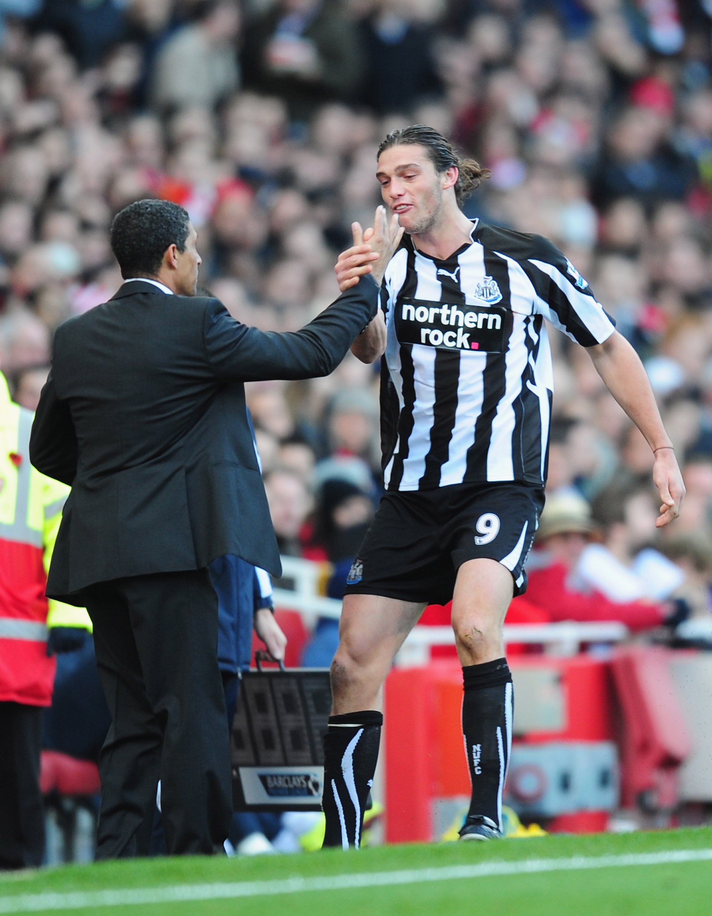 LONDON, ENGLAND - NOVEMBER 07:  Andy Carroll of Newcastle celebrates with manager Chris Hughton after scoring during the Barclays Premier League match between Arsenal and Newcastle United at the Emirates Stadium on November 7, 2010 in London, England.  (P