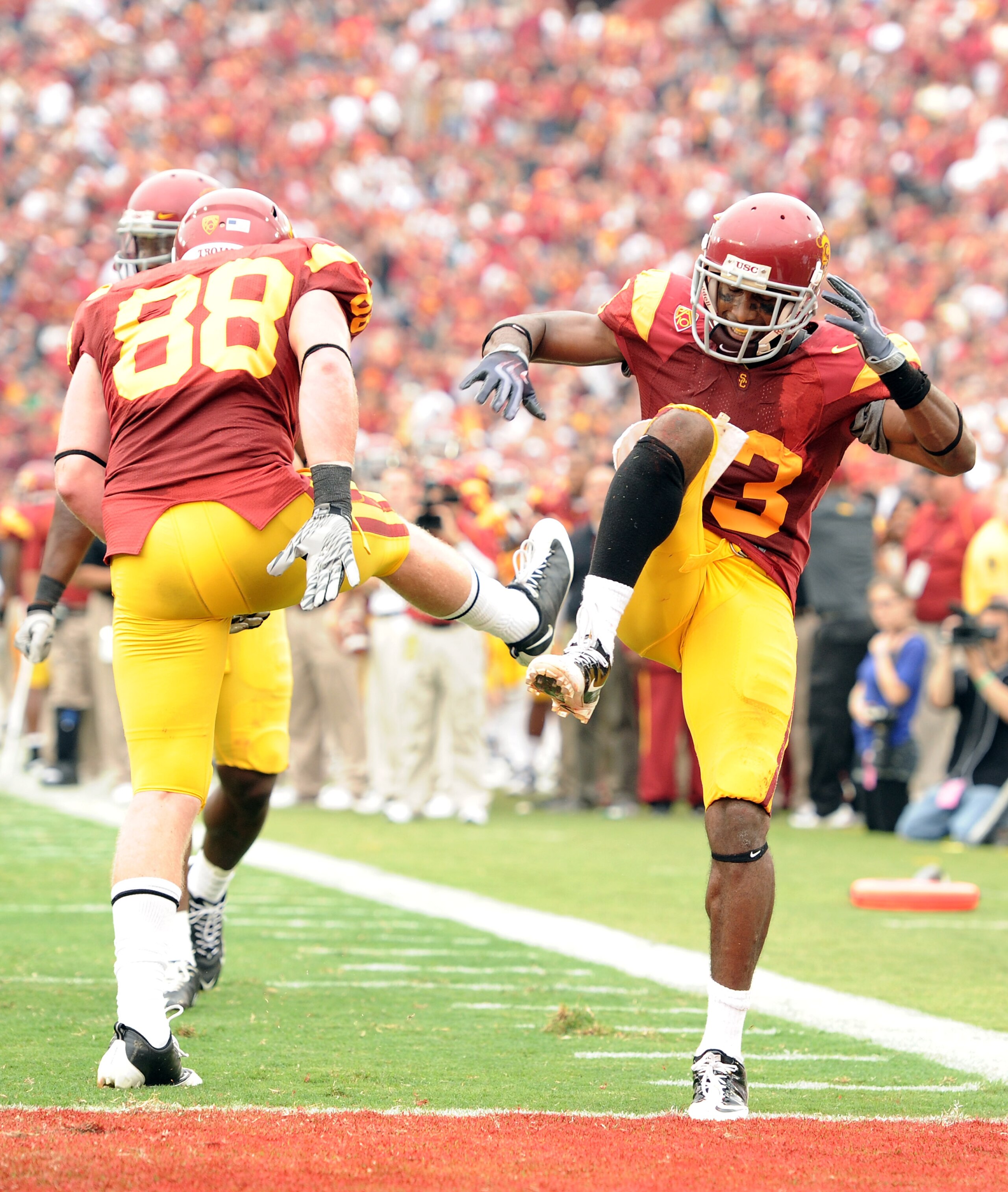 LOS ANGELES, CA - OCTOBER 16:  Ronald Johnson #83 of the USC Trojans celebrates his touchdown with Blake Ayles #88 for a 35-0 lead over the California Golden Bears during the second quarter at Los Angeles Memorial Coliseum on October 16, 2010 in Los Angel