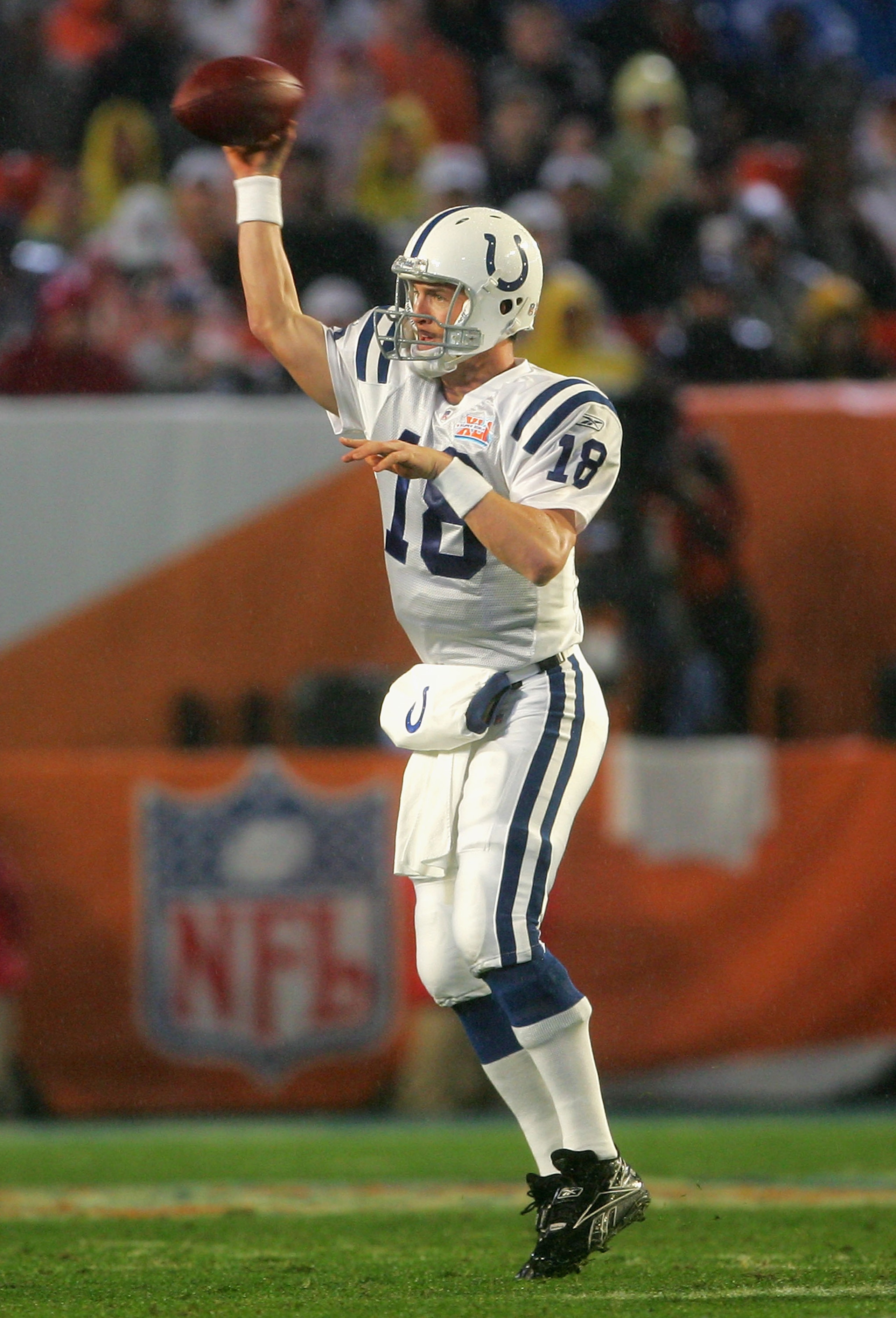 MIAMI GARDENS, FL - FEBRUARY 04:  Quarterback Peyton Manning #18 of the Indianapolis Colts attempts a pass during Super Bowl XLI  against the Chicago Bears on February 4, 2007 at Dolphin Stadium in Miami Gardens, Florida. The Colts won 29-17.  (Photo by D