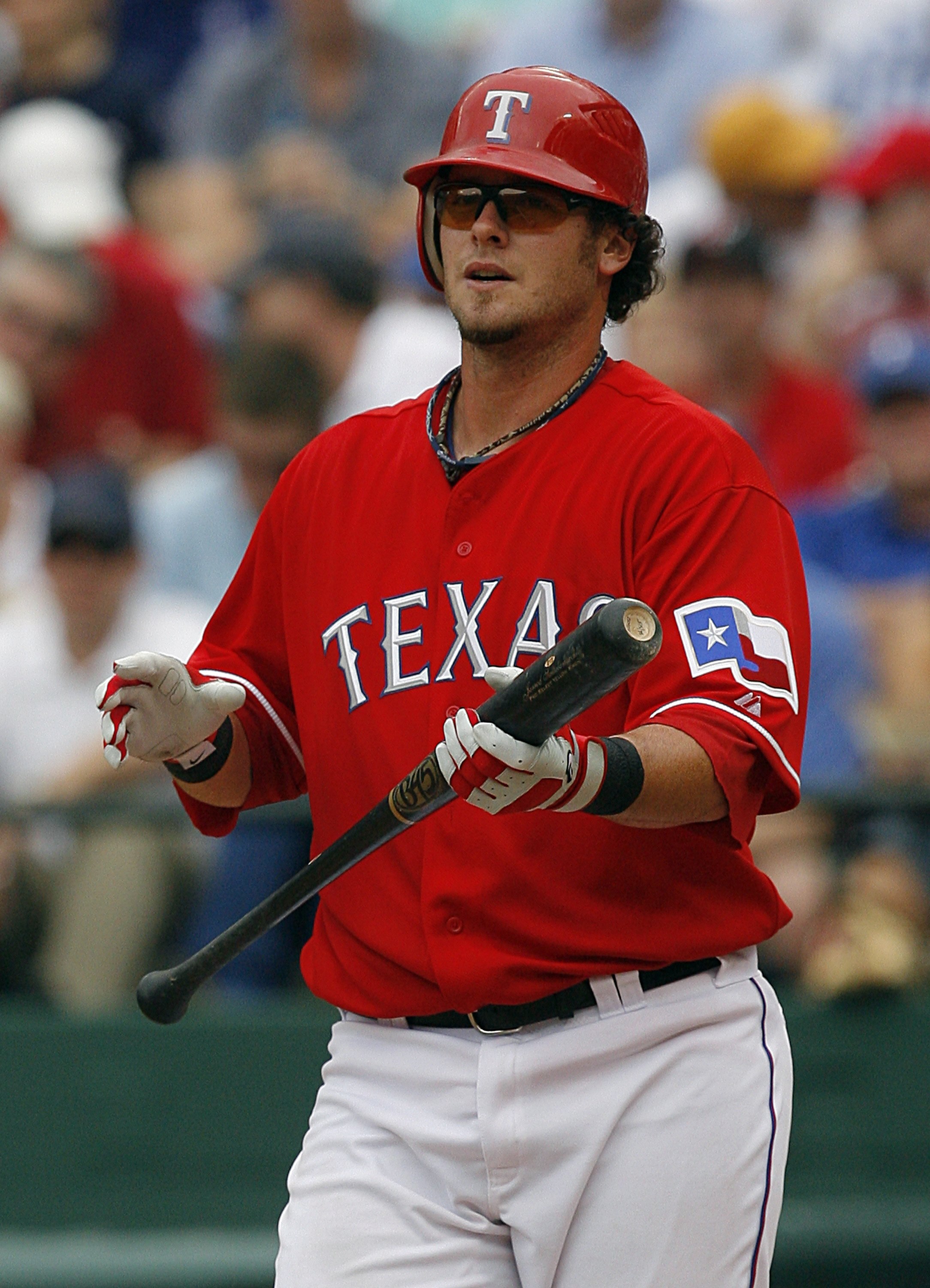 ARLINGTON, TX - APRIL 05:  Catcher Jarrod Saltalamacchia #21 of the Texas Rangers steps up to the plate against the Toronto Blue Jays on Opening Day at Rangers Ballpark on April 5, 2010 in Arlington, Texas. (Photo by Tom Pennington/Getty Images)