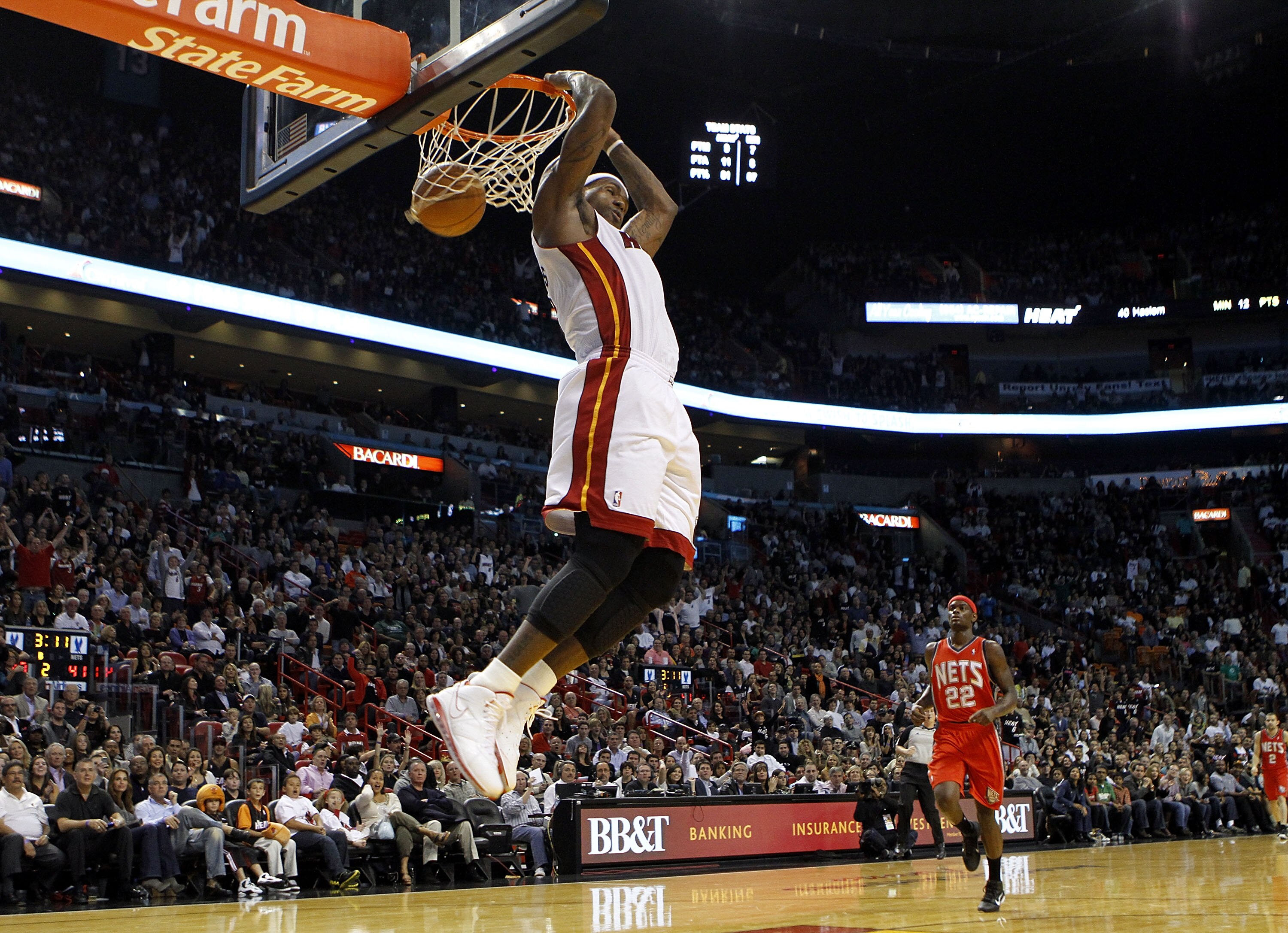 MIAMI - NOVEMBER 06:  Forward LeBron James #6 of the Miami Heat dunks against the New Jersey Nets  at American Airlines Arena on November 6, 2010 in Miami, Florida. NOTE TO USER: User expressly acknowledges and agrees that, by downloading and or using thi