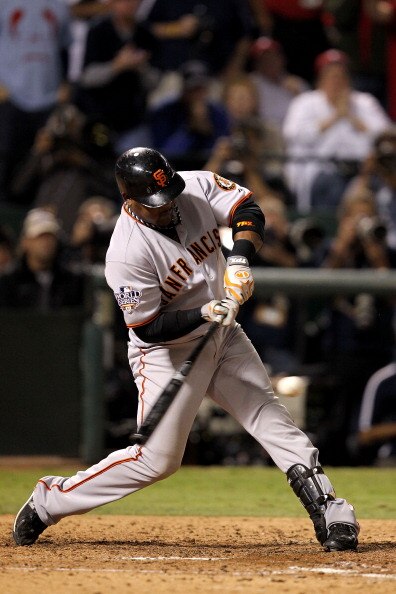 ARLINGTON, TX - NOVEMBER 01:  Juan Uribe #5 of the San Francisco Giants singles in the seventh inning against the Texas Rangers in Game Five of the 2010 MLB World Series at Rangers Ballpark in Arlington on November 1, 2010 in Arlington, Texas. The Giants
