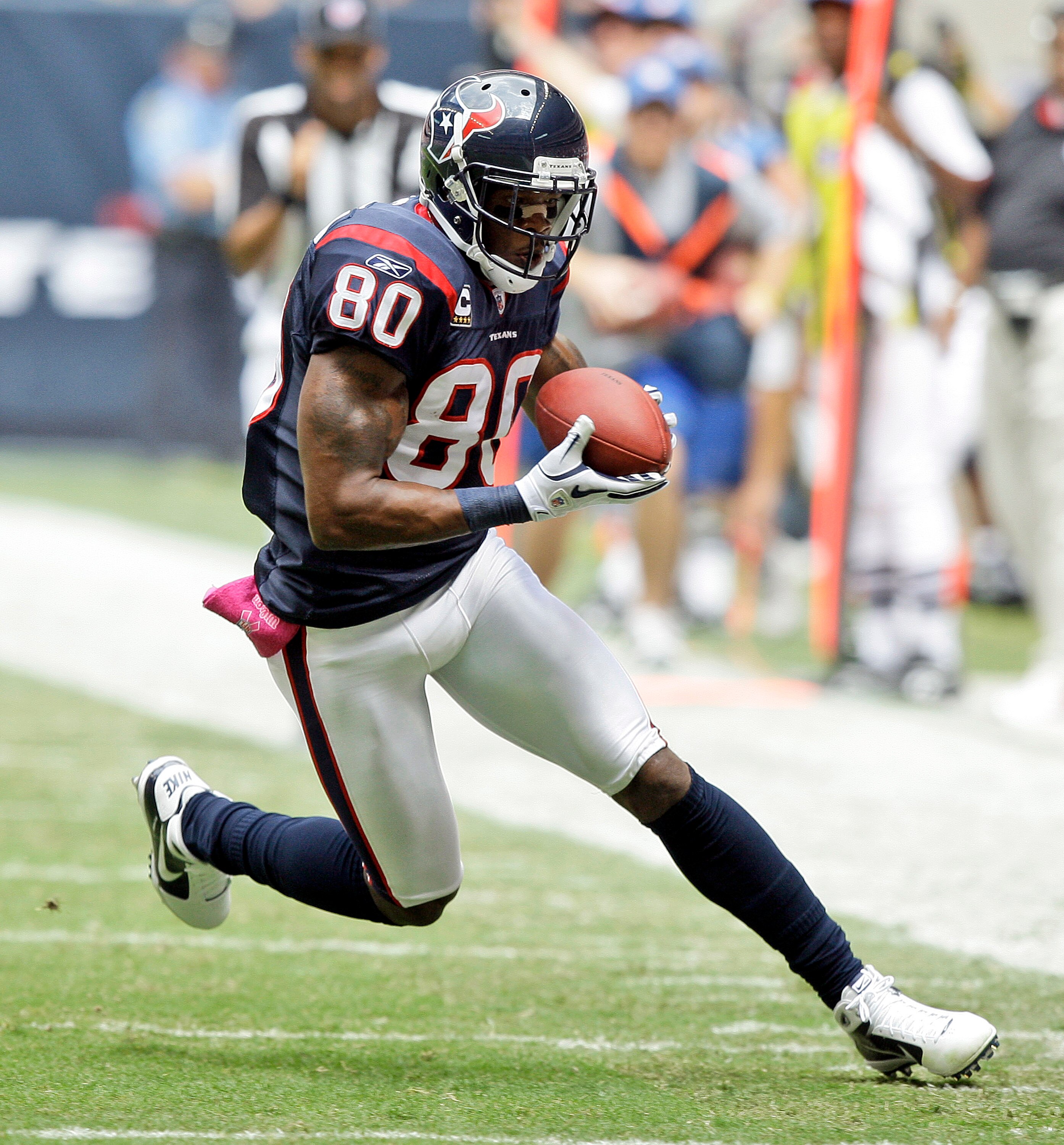 HOUSTON - OCTOBER 17:  Andre Johnson #80 of the Houston Texans completes a pass during game action against the Kansas City Chiefs at Reliant Stadium on October 17, 2010 in Houston, Texas.  (Photo by Bob Levey/Getty Images)