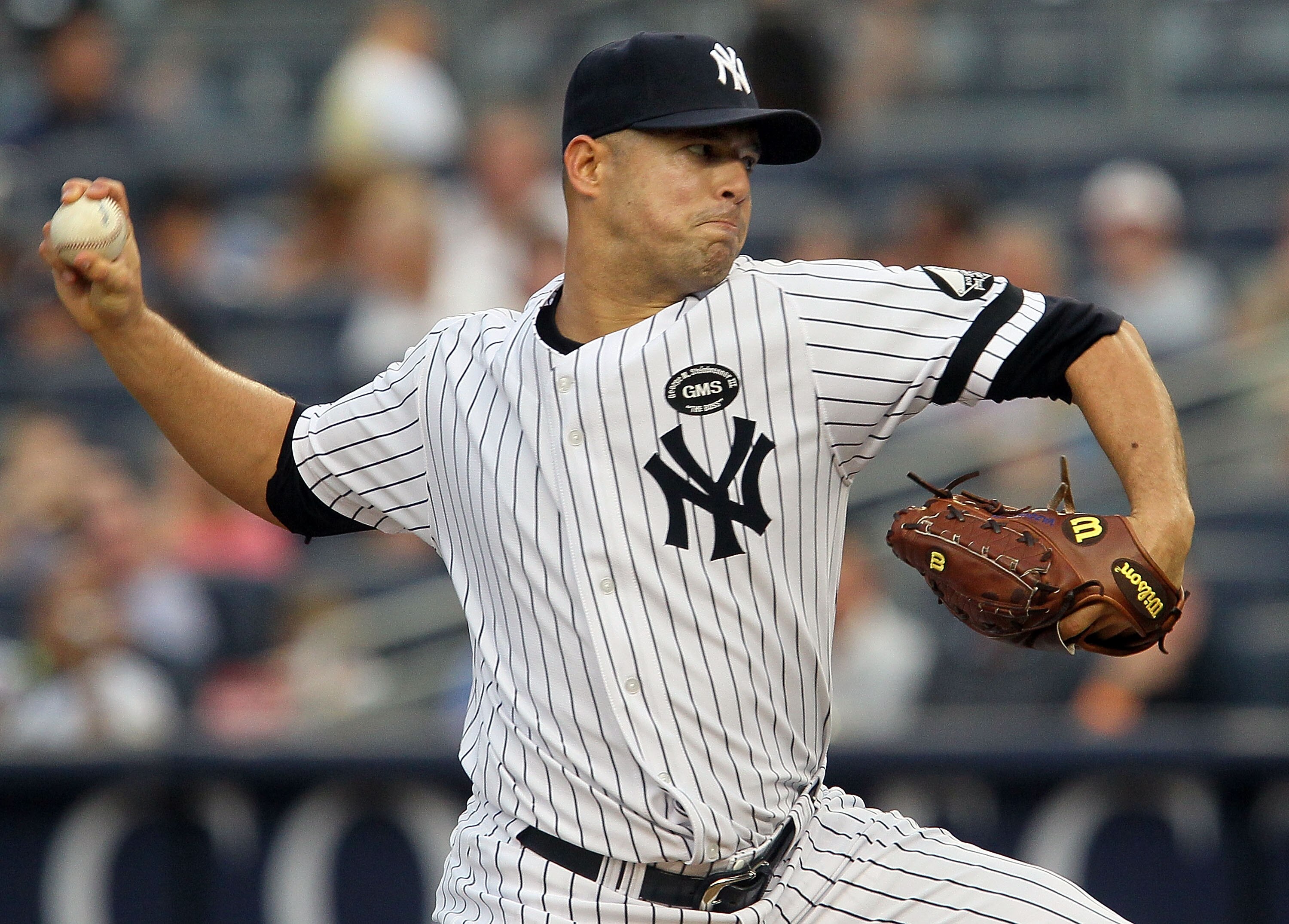 NEW YORK - AUGUST 16:  Javier Vazquez #31 of the New York Yankees delivers a pitch against the Detroit Tigers on August 16, 2010 at Yankee Stadium in the Bronx borough of New York City.  (Photo by Jim McIsaac/Getty Images)