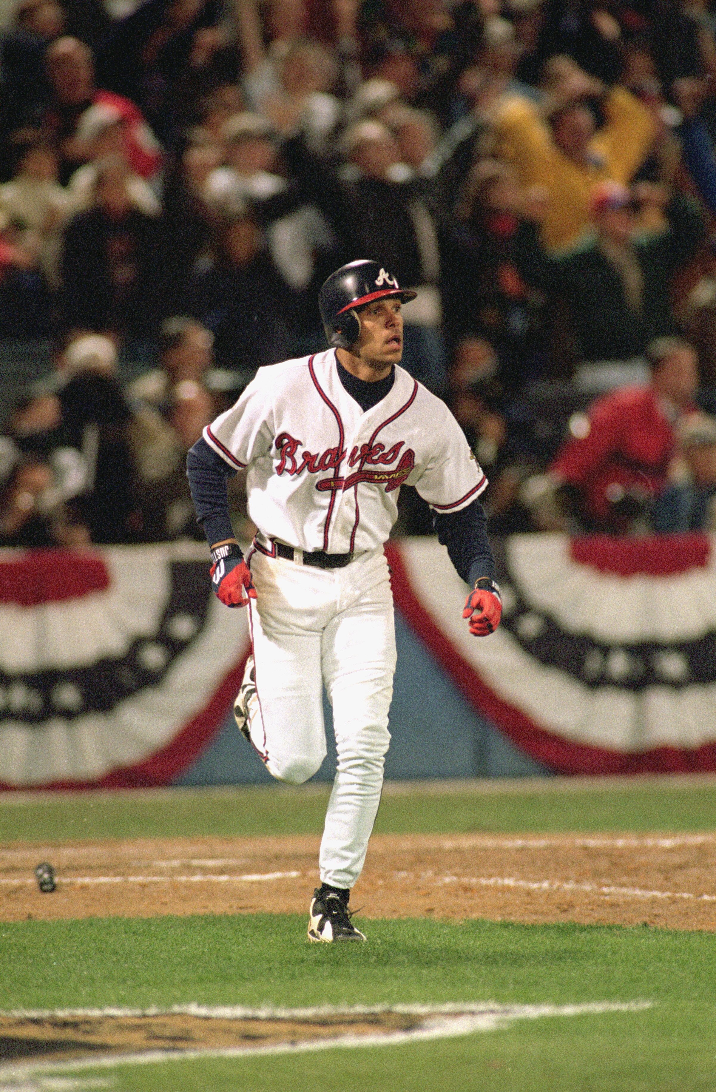 ATLANTA - OCTOBER 28:  David Justice #23 of the Atlanta Braves runs to first base during Game six of the 1995 World Series against the Cleveland Indians on October 28, 1995 at Atlanta-Fulton County Stadium in Atlanta, Georgia. The Braves defeated the Indi