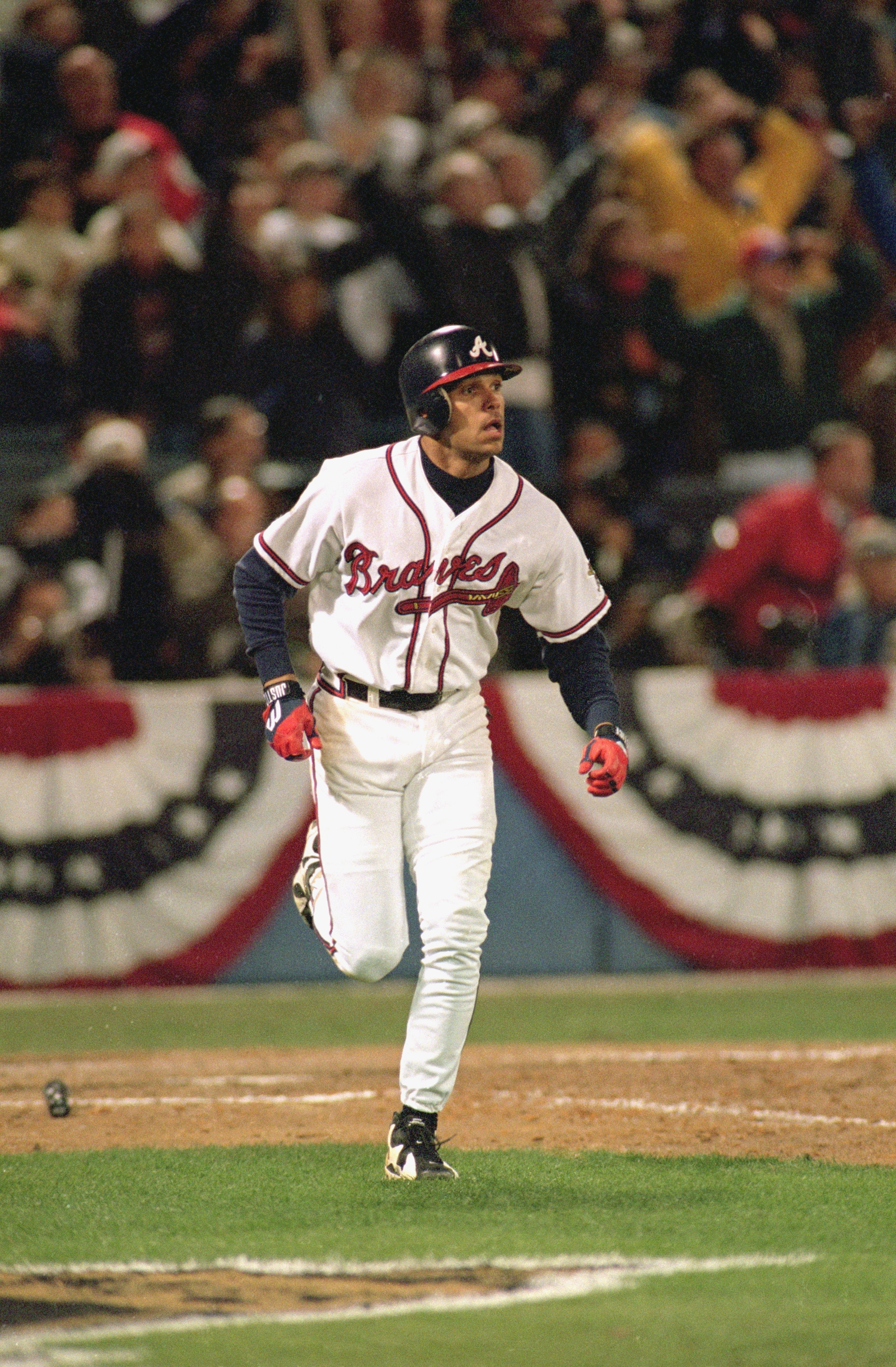 ATLANTA - OCTOBER 28:  David Justice #23 of the Atlanta Braves runs to first base during Game six of the 1995 World Series against the Cleveland Indians on October 28, 1995 at Atlanta-Fulton County Stadium in Atlanta, Georgia. The Braves defeated the Indi