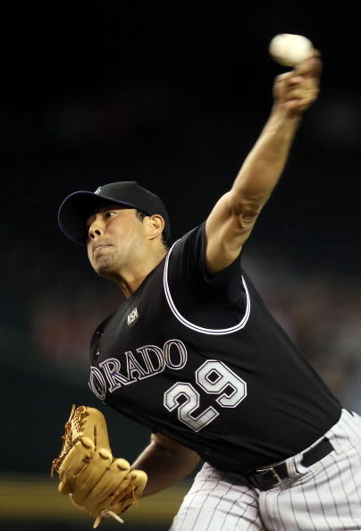 PHOENIX - SEPTEMBER 21:  Starting pitcher Jorge De La Rosa #29 of the Colorado Rockies pitches against the Arizona Diamondbacks during the Major League Baseball game at Chase Field on September 21, 2010 in Phoenix, Arizona.  (Photo by Christian Petersen/G