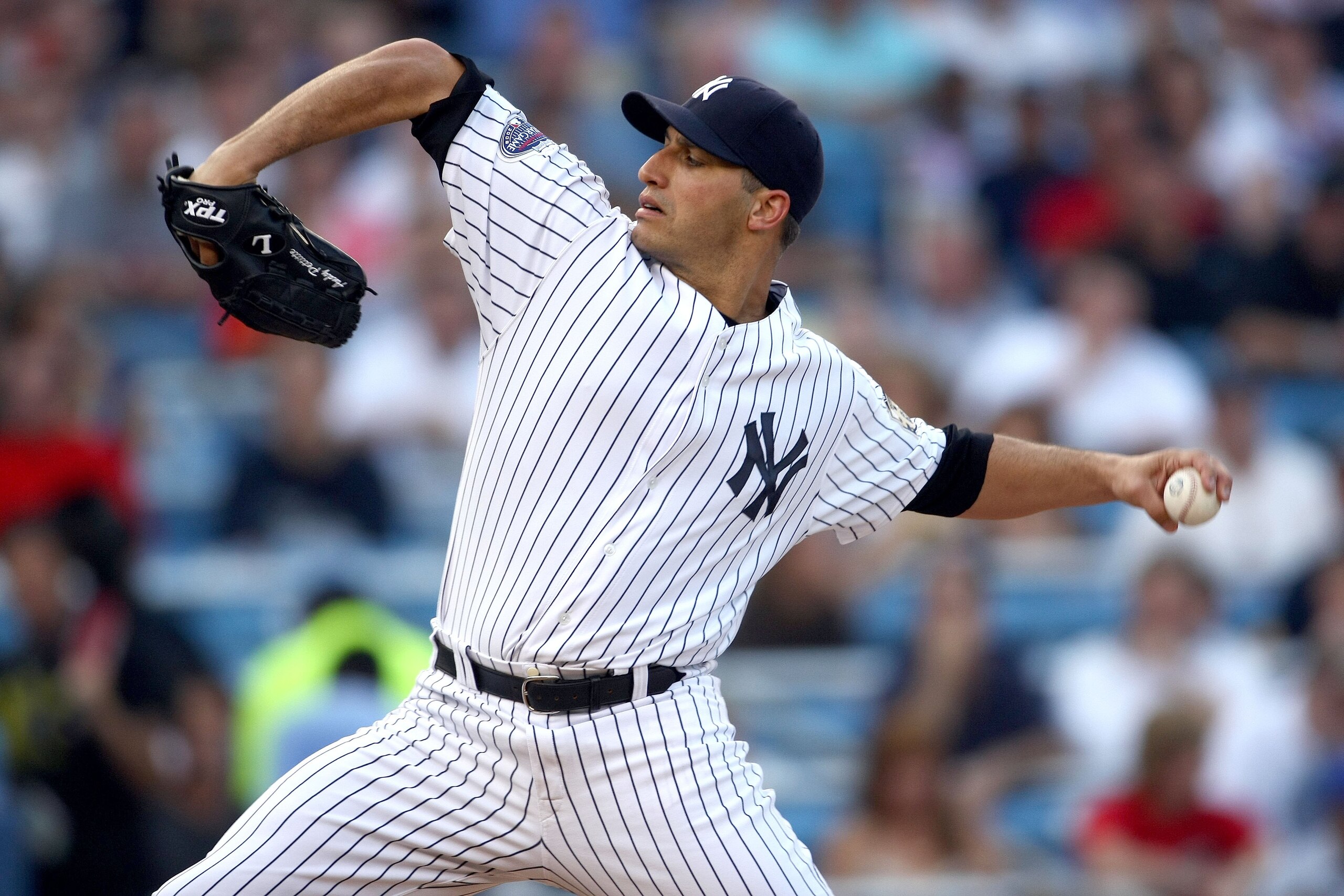 NEW YORK - JULY 8:  Andy Pettite #46 of the New York Yankees delivers a pitch during their MLB game against the Tampa Bay Rays on July 8, 2008 at Yankee Stadium in the Bronx borough of New York City. The Yankees defeated the Rays 5-0. (Photo by Chris McGr
