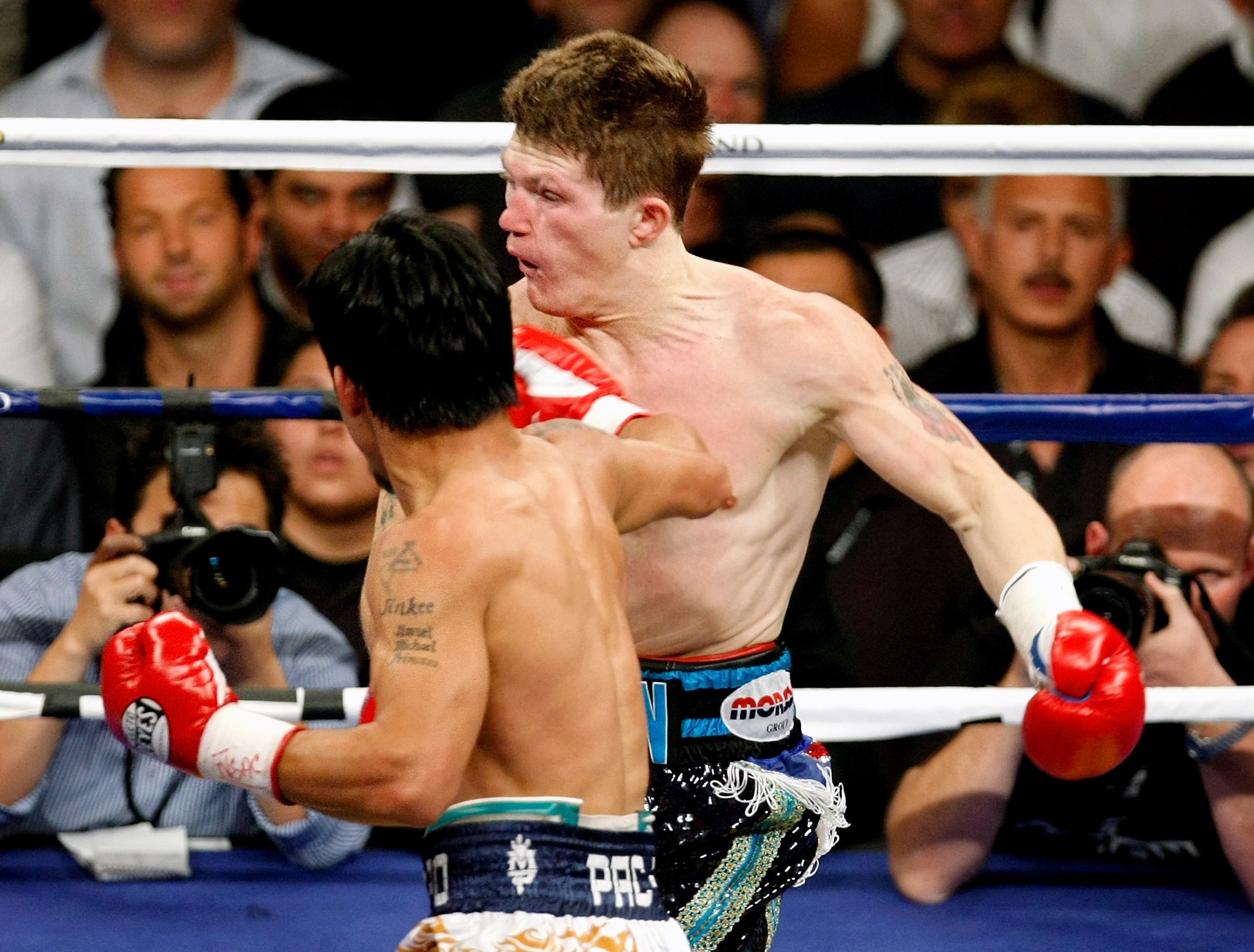 LAS VEGAS - MAY 02: Manny Pacquiao of the Philippines hits Ricky Hatton of England during the first round of their junior welterweight title fight at the MGM Grand Garden Arena May 2, 2009 in Las Vegas, Nevada. Pacquiao defeated Hatton by a second round LAS VEGAS - MAY 02: Manny Pacquiao of the Philippines hits Ricky Hatton of England during the first round of their junior welterweight title fight at the MGM Grand Garden Arena May 2, 2009 in Las Vegas, Nevada. Pacquiao defeated Hatton by a second round