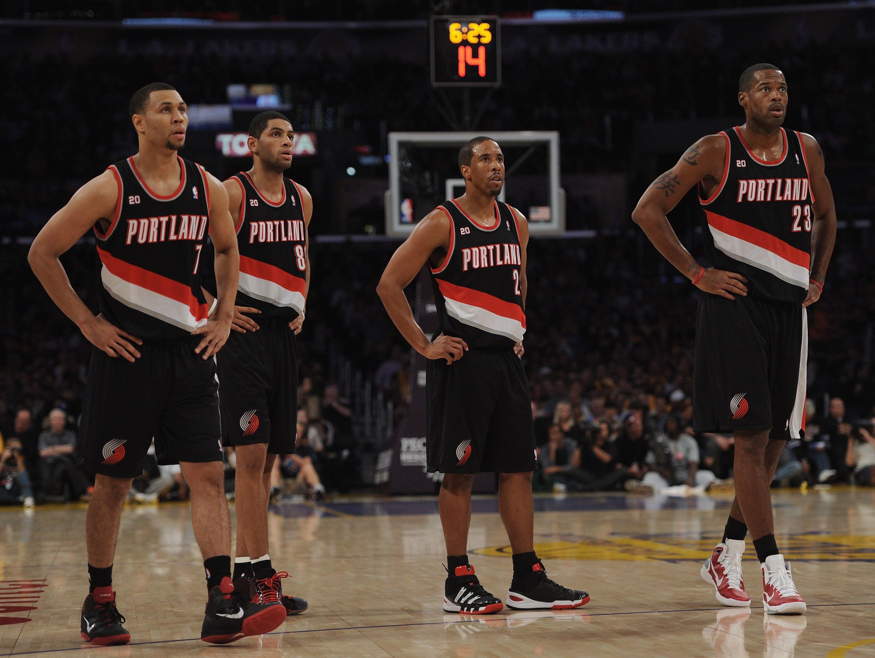 LOS ANGELES, CA - NOVEMBER 07:  Brandon Roy #7, Nicolas Batum #88, Andre Miller #24 and Marcus Camby #23 of the Portland Trail Blazers watch a Los Angeles Lakers freethrow during the first half at the Staples Center on November 7, 2010 in Los Angeles, Cal
