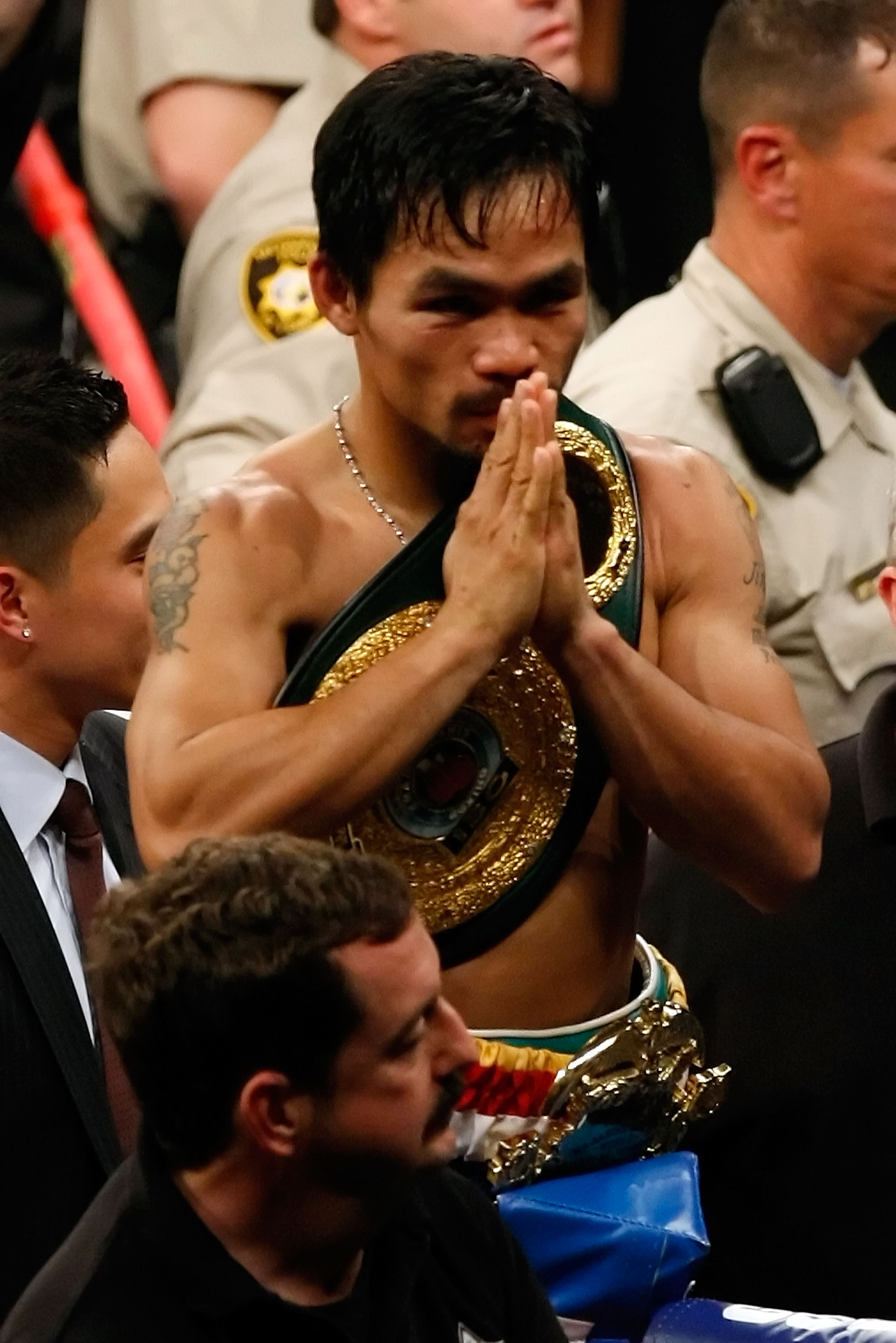 LAS VEGAS - MAY 02:  Manny Pacquiao of the Philippines celebrates after knocking out Ricky Hatton of England in the second round during their junior welterweight title fight at the MGM Grand Garden Arena May 2, 2009 in Las Vegas, Nevada.  (Photo by Ethan 