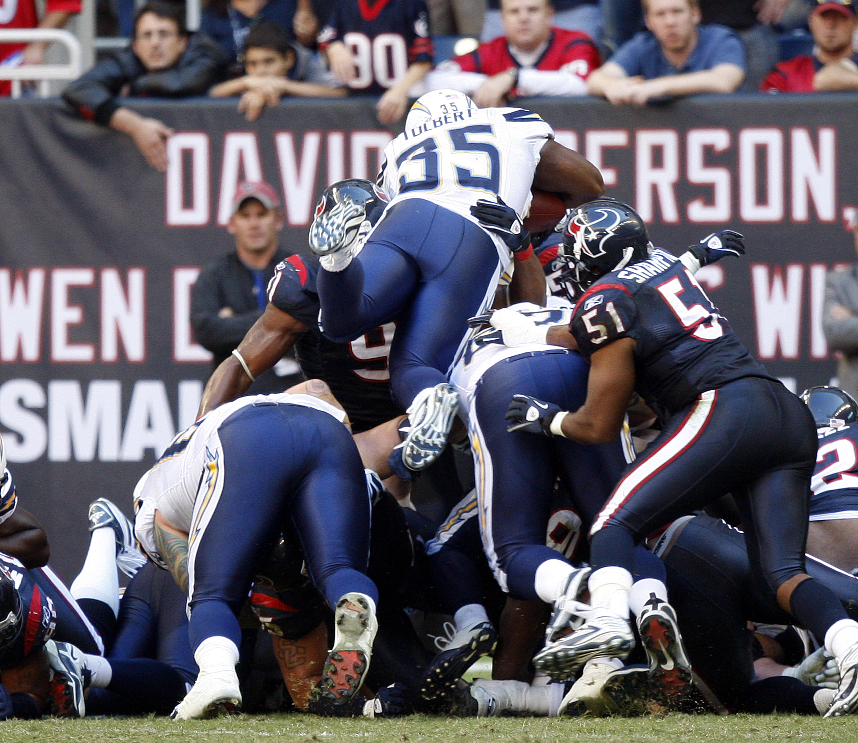 HOUSTON - NOVEMBER 07: Running back Mike Tolbert #35 of the San Diego Chargers leaps over he top to complete a two point conversion against the Houston Texans at Reliant Stadium on November 7, 2010 in Houston, Texas. (Photo by Bob Levey/Getty Images) HOUSTON - NOVEMBER 07: Running back Mike Tolbert #35 of the San Diego Chargers leaps over he top to complete a two point conversion against the Houston Texans at Reliant Stadium on November 7, 2010 in Houston, Texas. (Photo by Bob Levey/Getty Images)
