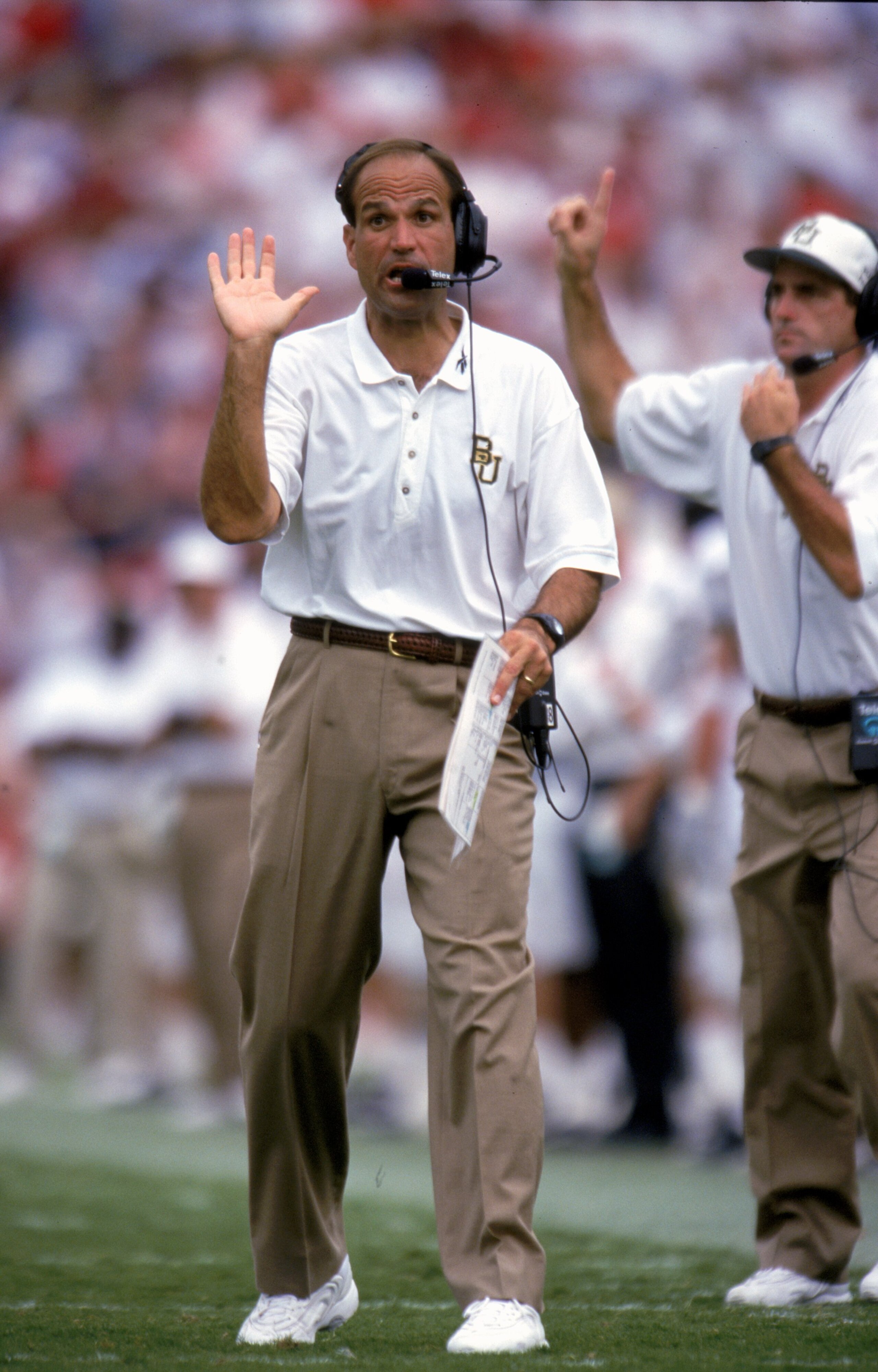 18 Sep 1999: Kevin Steele of the Baylor Bears motions from the sidelines during a game against the Oklahoma Sooners at Owen Field in Norman, Oklahoma. The Sooners defeated the Bears 41-10.