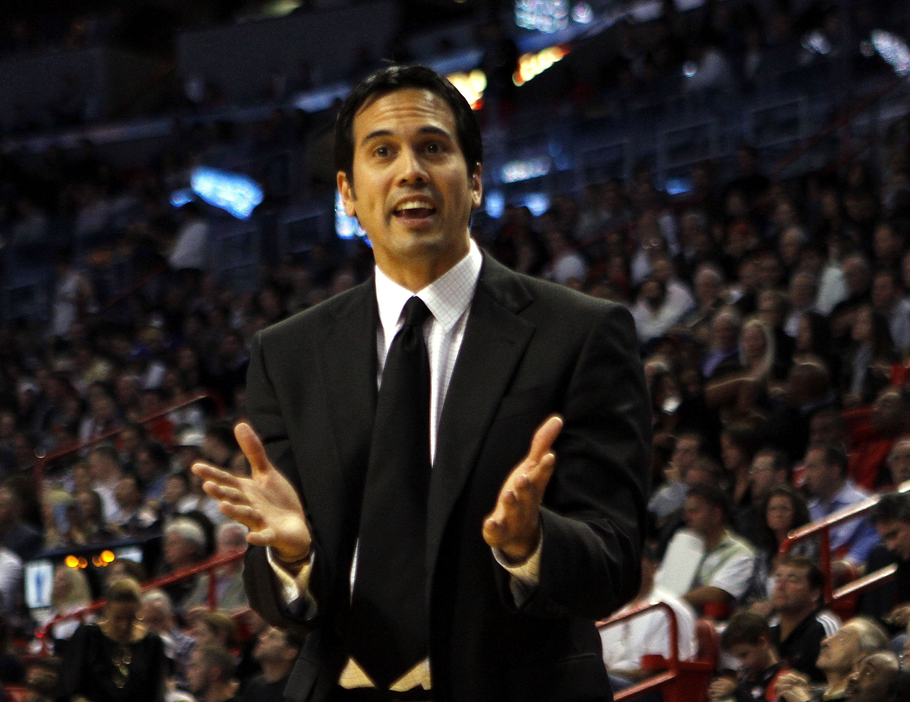 MIAMI - NOVEMBER 06:  Head coach Erik Spoelstra of the Miami Heat calls plays against the New Jersey Nets  at American Airlines Arena on November 6, 2010 in Miami, Florida. NOTE TO USER: User expressly acknowledges and agrees that, by downloading and or u