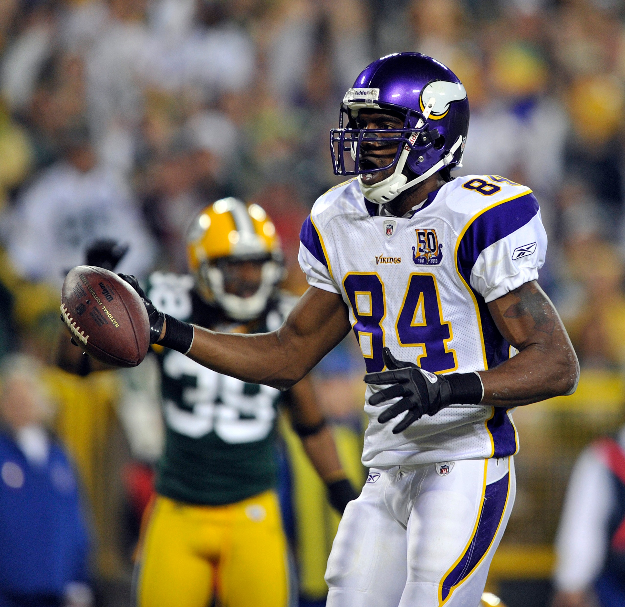 GREEN BAY, WI - OCTOBER 24: Randy Moss #84 of the Minnesota Vikings celebrates a touchdown against the Green Bay Packers during their game at Lambeau Field on October 24, 2010 in Green Bay, Wisconsin. (Photo by Jim Prisching/Getty Images) GREEN BAY, WI - OCTOBER 24: Randy Moss #84 of the Minnesota Vikings celebrates a touchdown against the Green Bay Packers during their game at Lambeau Field on October 24, 2010 in Green Bay, Wisconsin. (Photo by Jim Prisching/Getty Images)