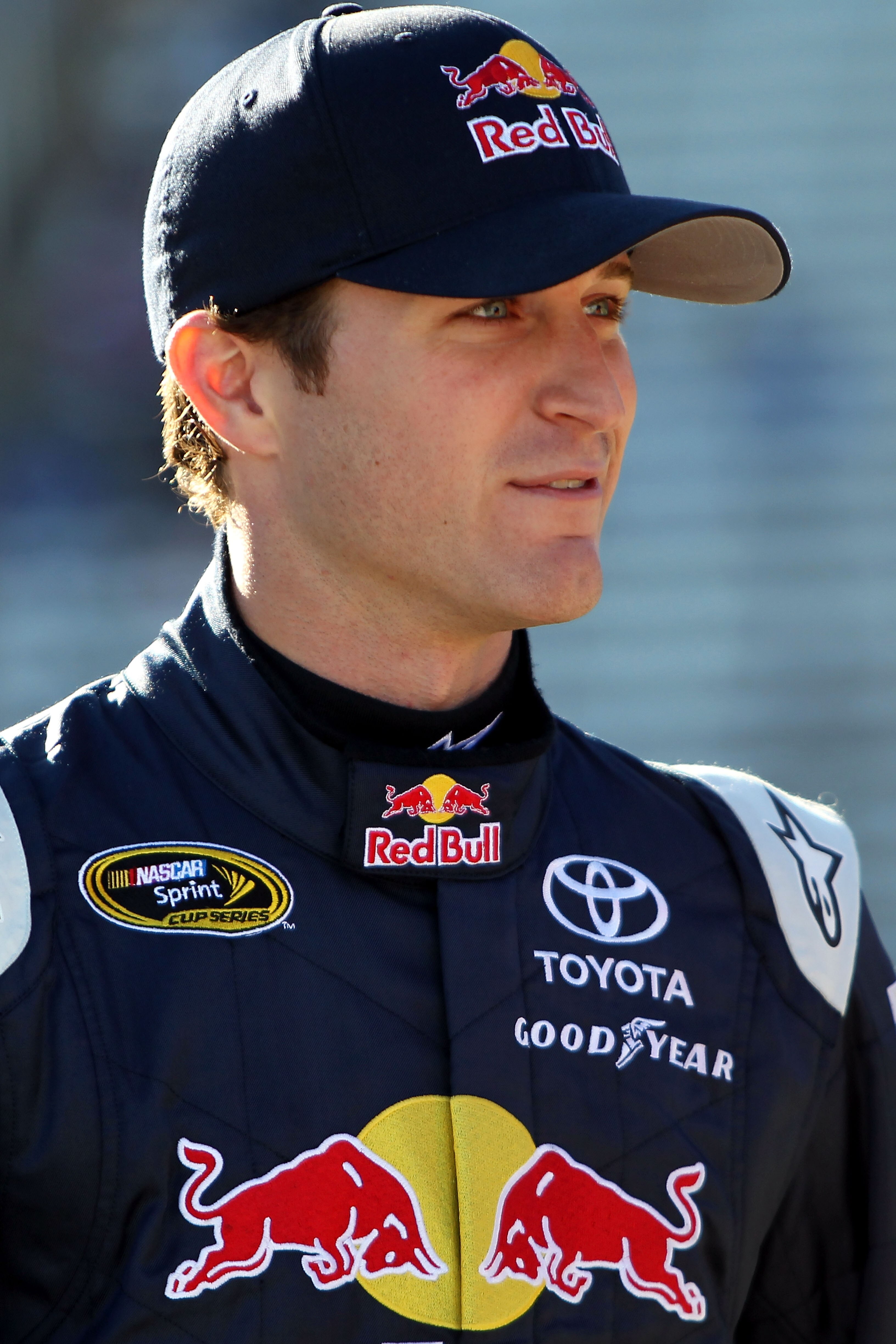 FORT WORTH, TX - NOVEMBER 05:  Kasey Kahne, driver of the #83 Red Bull Toyota, walks on the grid during qualifying for the NASCAR Sprint Cup Series AAA Texas 500 at Texas Motor Speedway on November 5, 2010 in Fort Worth, Texas.  (Photo by Jonathan Ferrey/