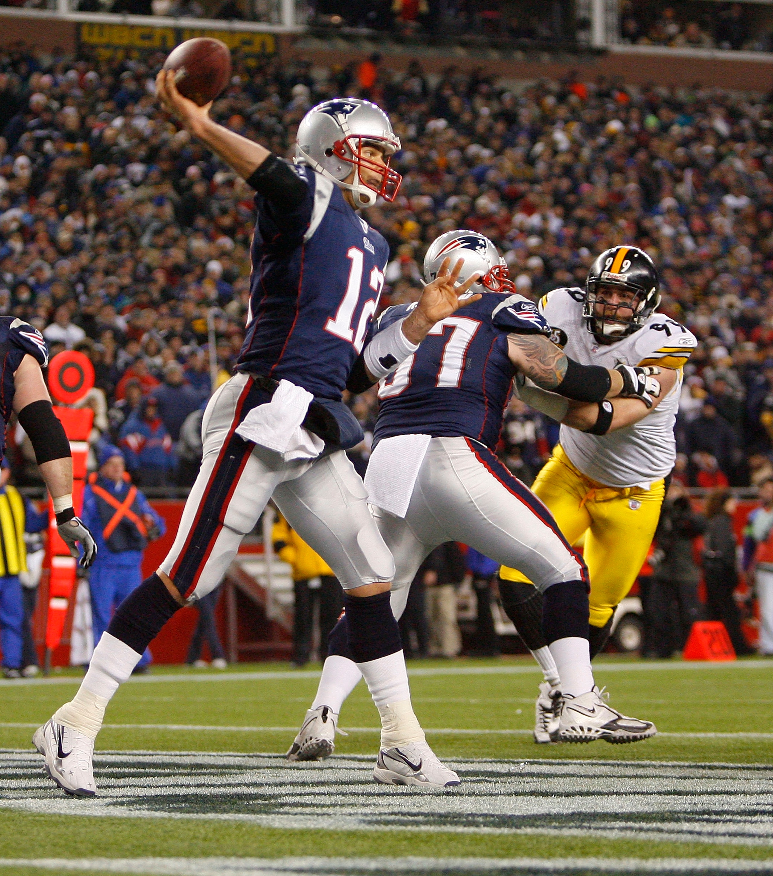 FOXBORO, MA - DECEMBER 9:   Tom Brady #12 of the New England Patriots throws during a game with the Pittsburgh Steelers at Gillette Stadium December 9, 2007 in Foxboro, Massachusetts. The Patriots won 34-13.  (Photo by Jim Rogash/Getty Images)