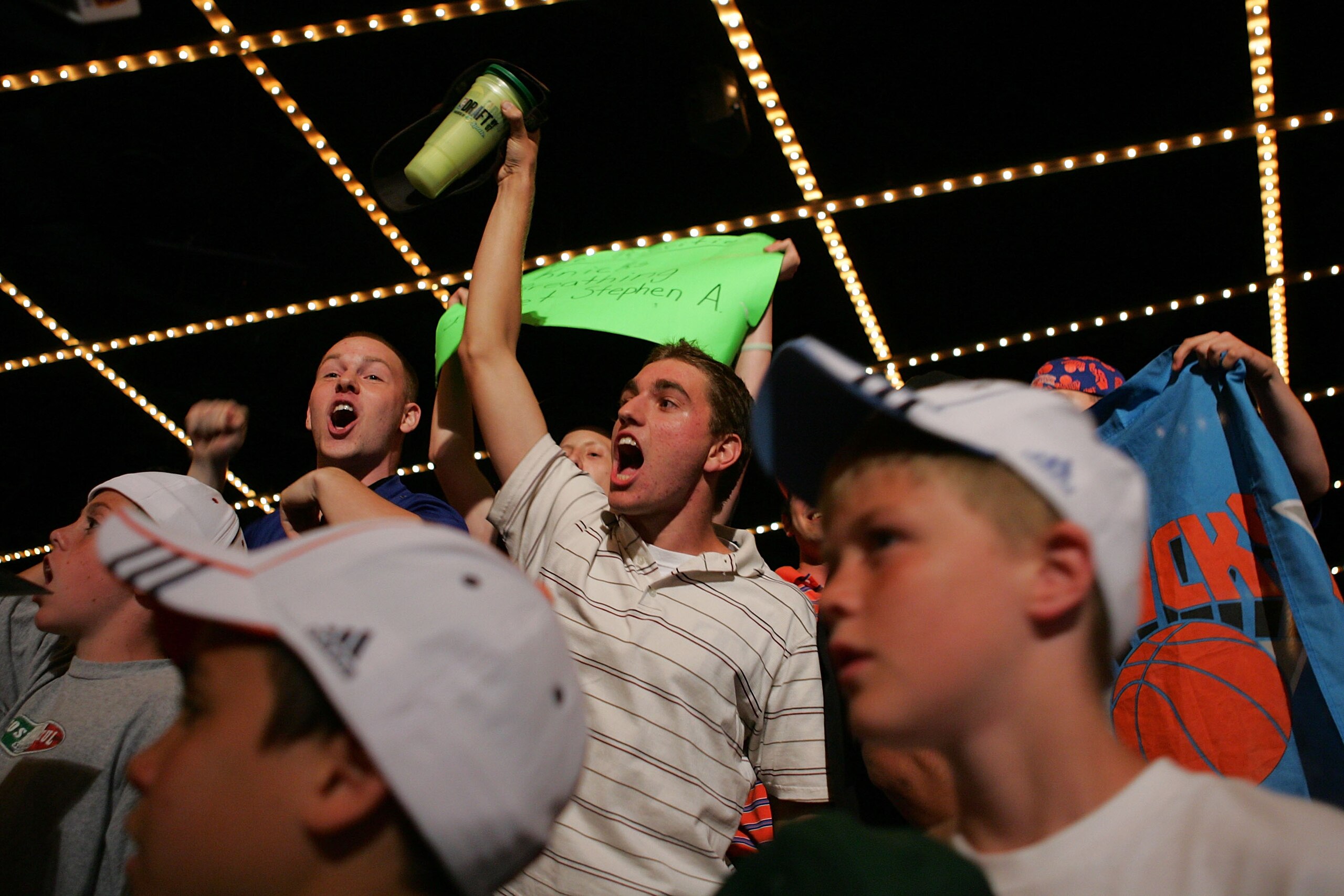 NEW YORK - JUNE 28: New York Knicks fans celebrate the Knicks' 23rd pick of Wilson Chandler of DePaul during the 2007 NBA Draft at the WaMu Theatre at Madison Square Garden June 28, 2007 in New York City. NOTE TO USER: User expressly acknowledges and agre