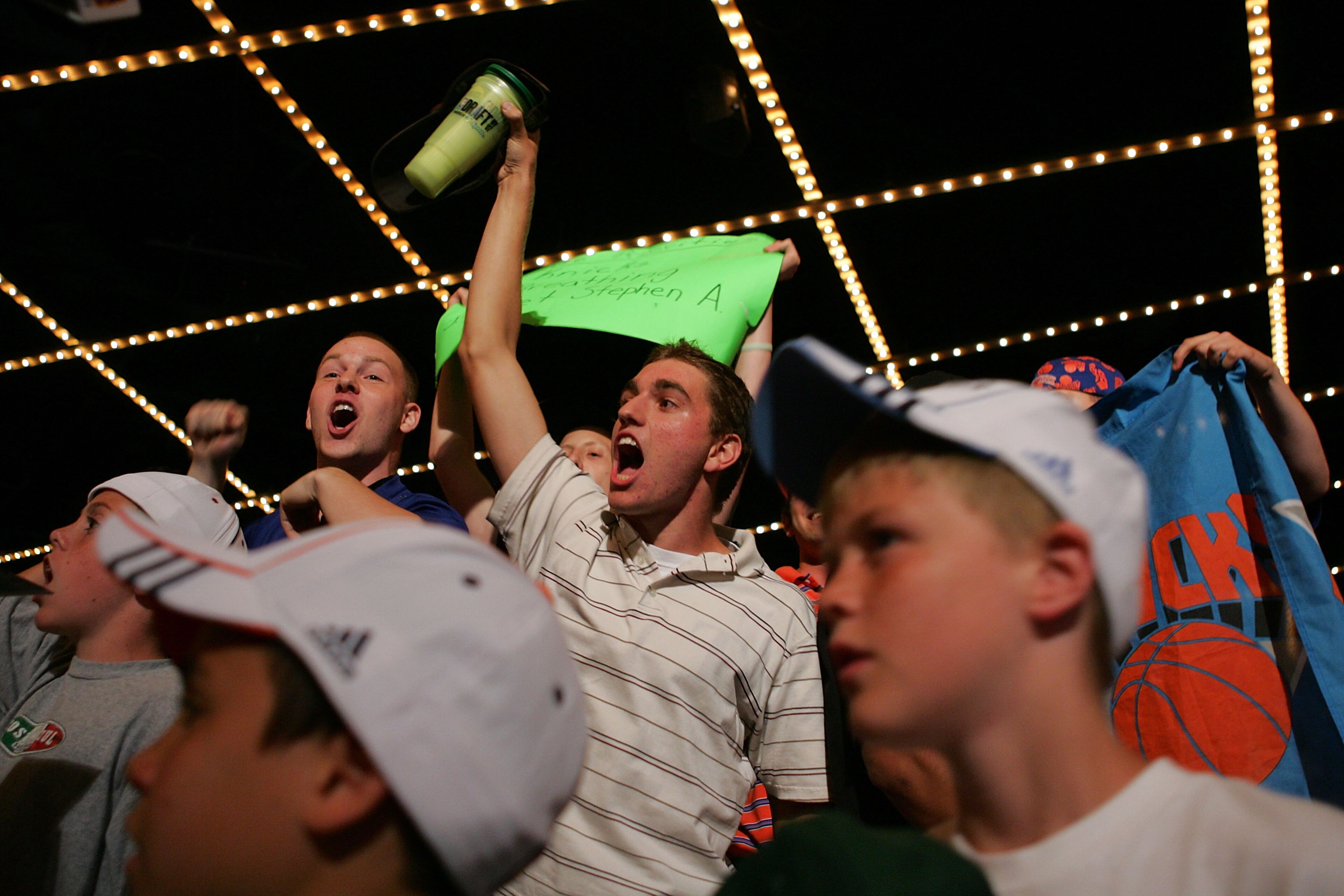 NEW YORK - JUNE 28: New York Knicks fans celebrate the Knicks' 23rd pick of Wilson Chandler of DePaul during the 2007 NBA Draft at the WaMu Theatre at Madison Square Garden June 28, 2007 in New York City. NOTE TO USER: User expressly acknowledges and agre