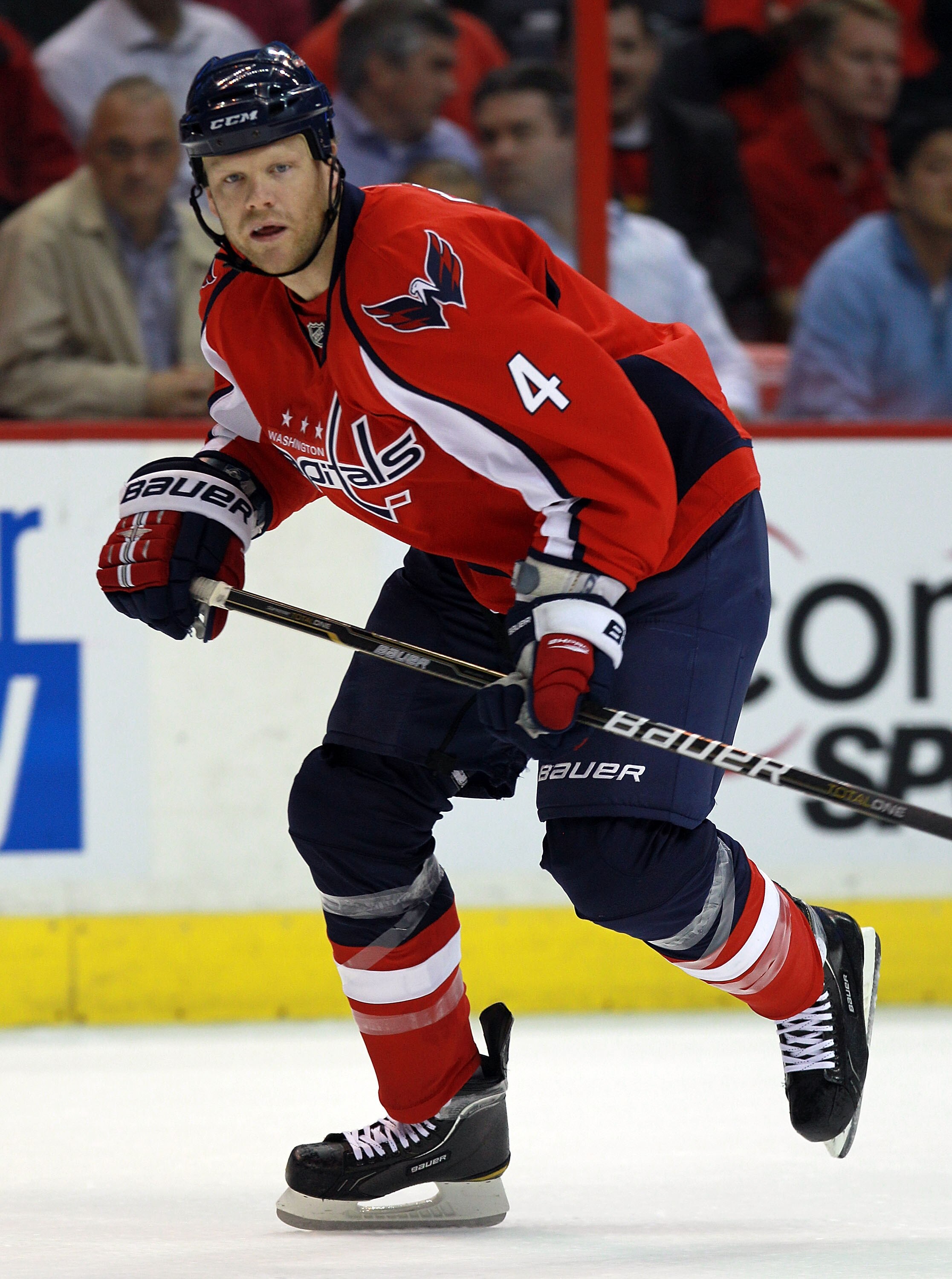 WASHINGTON - OCTOBER 13:  John Erskine #4 of the Washington Capitals skates against the New York Islanders at the Verizon Center on October 13, 2010 in Washington, DC.  (Photo by Bruce Bennett/Getty Images)