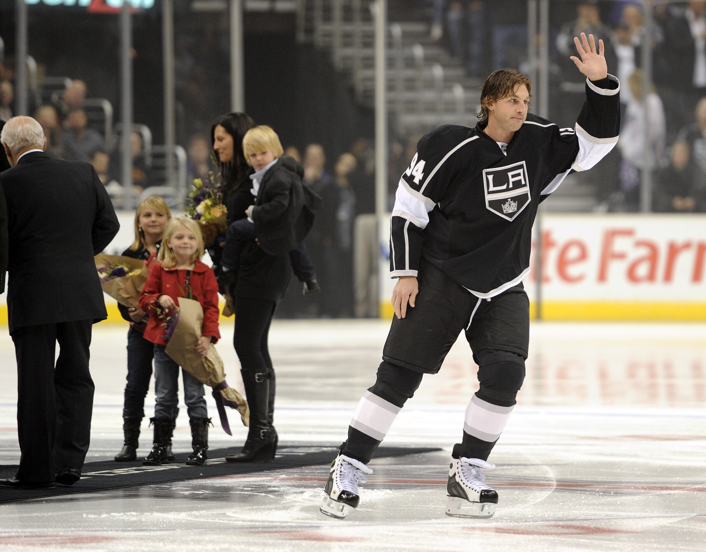LOS ANGELES, CA - NOVEMBER 11:  Ryan Smyth #94 of the Los Angeles Kings is honored with his family for playing in his 1000th game before the game between the Dallas Stars at the Staples Center on November 11, 2010 in Los Angeles, California.  (Photo by Ha