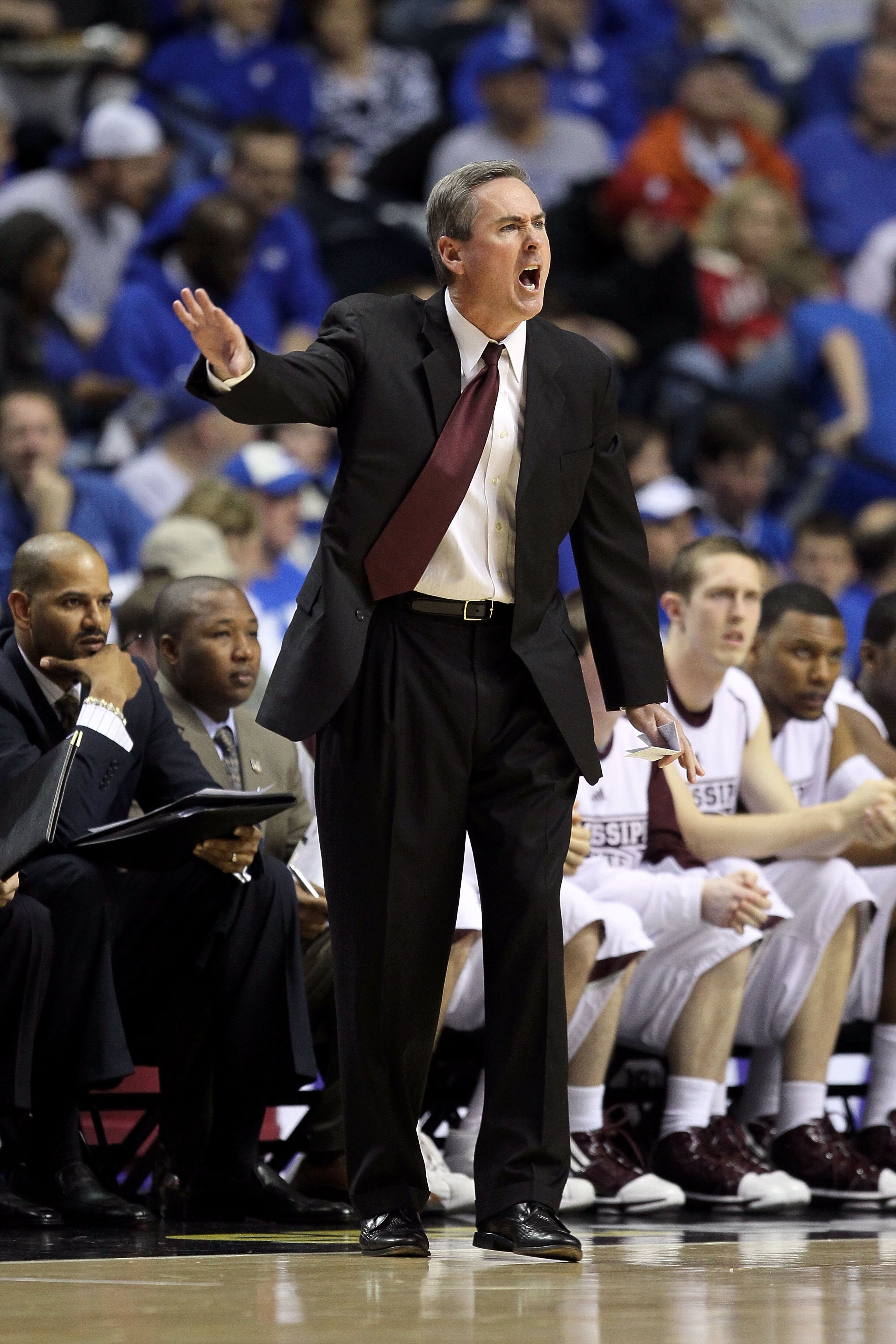 NASHVILLE, TN - MARCH 13:  Head coach Rick Stansbury of the Mississippi State Bulldogs reacts as he coaches against the Vanderbilt Commodores during the semifinals of the SEC Men's Basketball Tournament at the Bridgestone Arena on March 13, 2010 in Nashvi