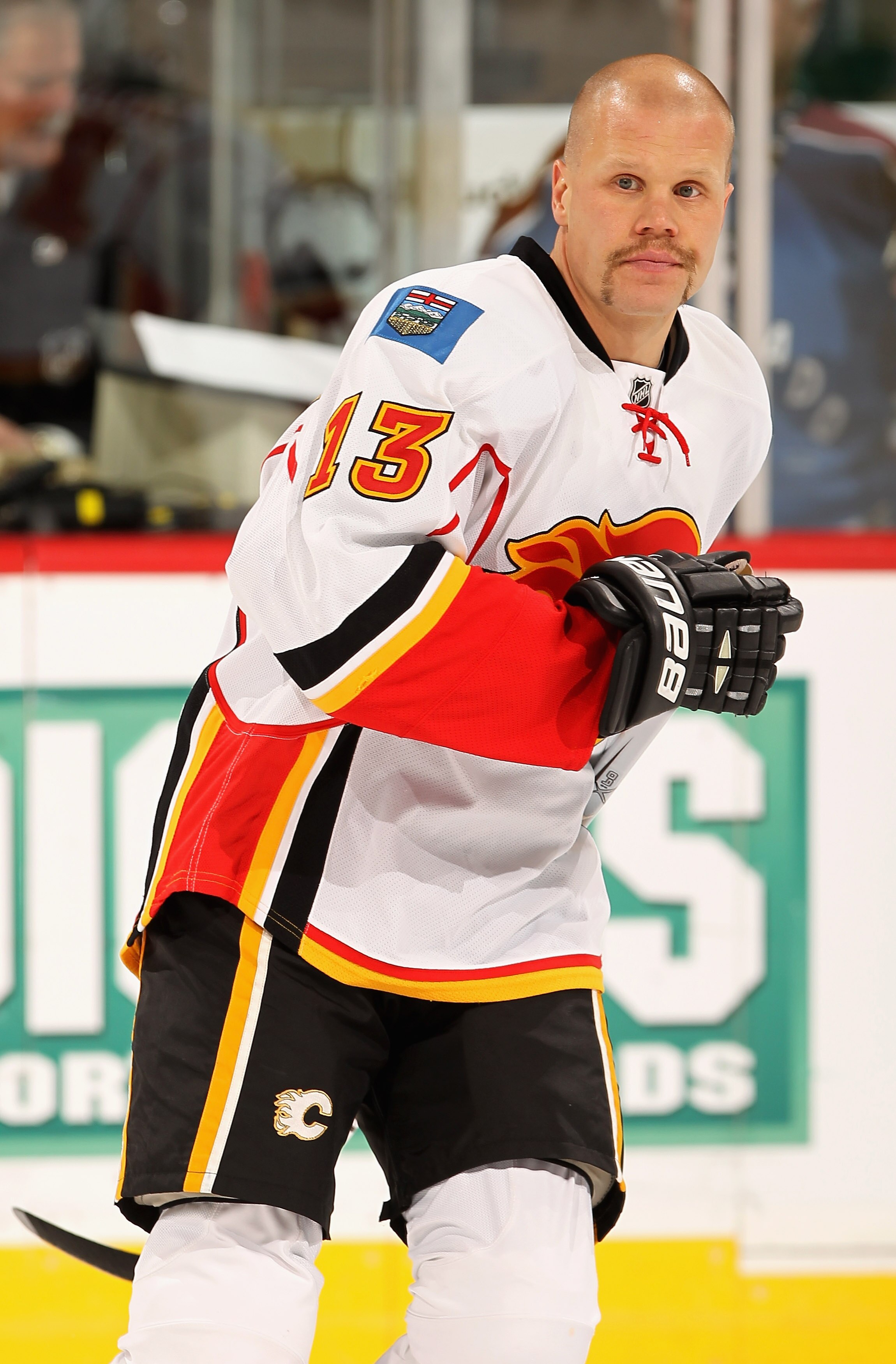 DENVER - NOVEMBER 09:  Olli Jokinen #13 of the Calgary Flames warms up prior to facing the Colorado Avalanche at the Pepsi Center on November 9, 2010 in Denver, Colorado. The Flames defeated the Avalanche 4-2.  (Photo by Doug Pensinger/Getty Images)