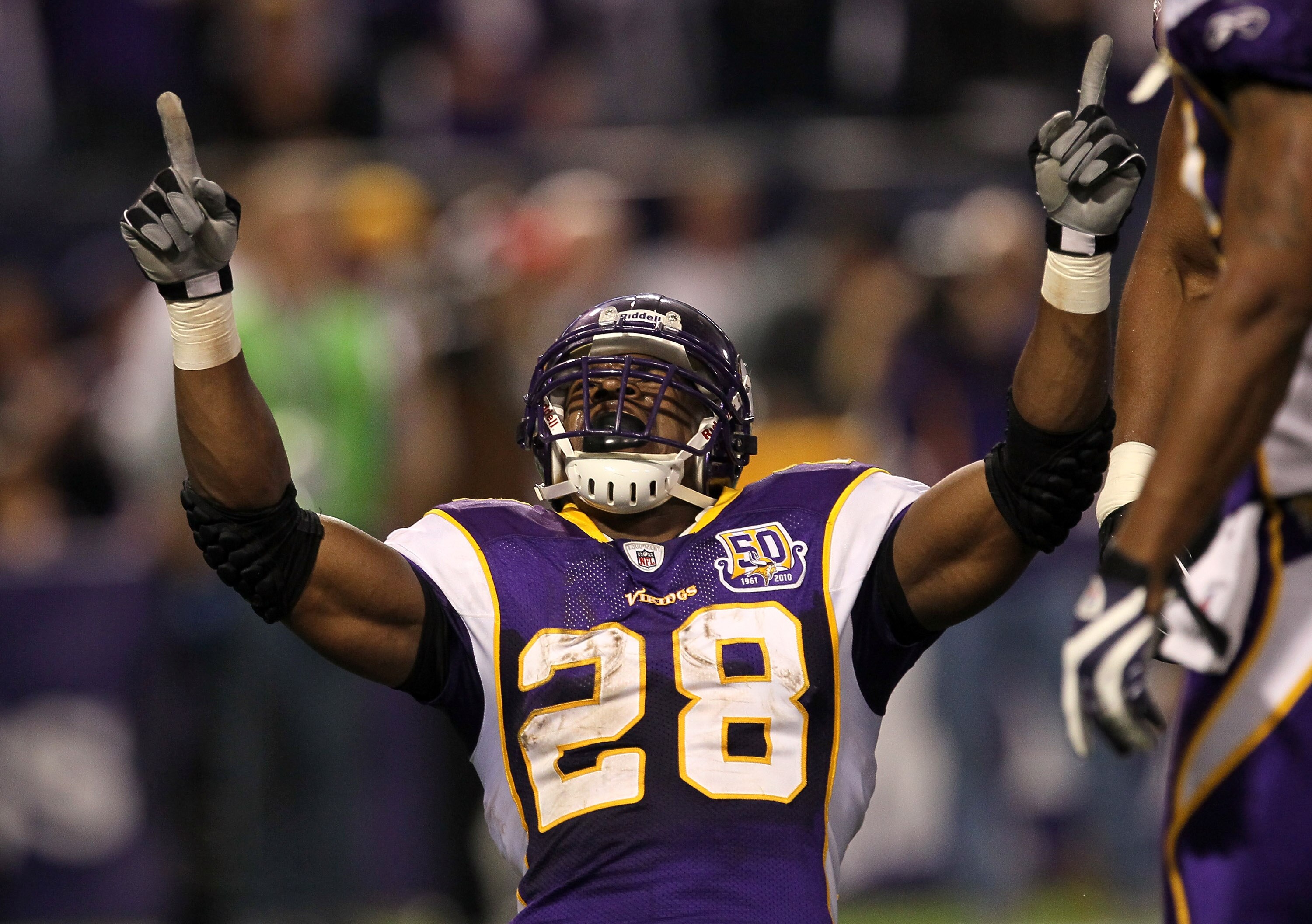 MINNEAPOLIS - NOVEMBER 07:  Running back Adrian Peterson #28 of the Minnesota Vikings celebrates after his four yard touchdown run brought the Vikings within a touchdown of the Arizona Cardinals in the fourth quarter at Hubert H. Humphrey Metrodome on Nov