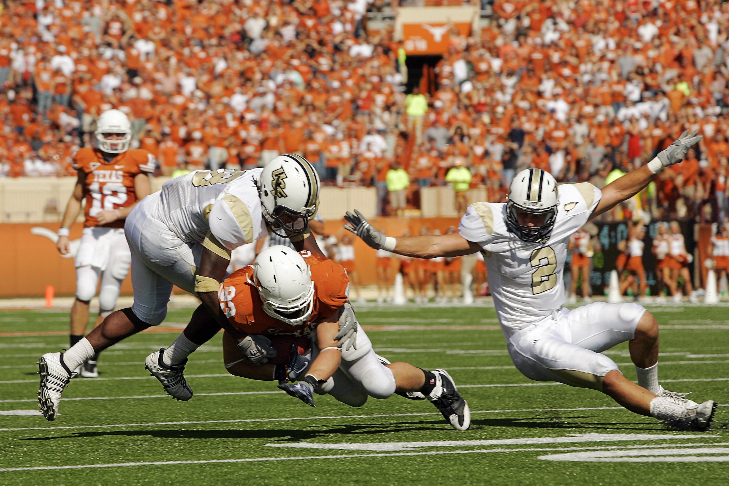 AUSTIN, TX - NOVEMBER 07: Tight end Greg Smith #83 of the Texas Longhorns runs with a catch against the UCF Knights on November 7, 2009 at Darrell K Royal - Texas Memorial Stadium in Austin, Texas. Texas won 35-3. (Photo by Brian Bahr/Getty Images) AUSTIN, TX - NOVEMBER 07: Tight end Greg Smith #83 of the Texas Longhorns runs with a catch against the UCF Knights on November 7, 2009 at Darrell K Royal - Texas Memorial Stadium in Austin, Texas. Texas won 35-3. (Photo by Brian Bahr/Getty Images)