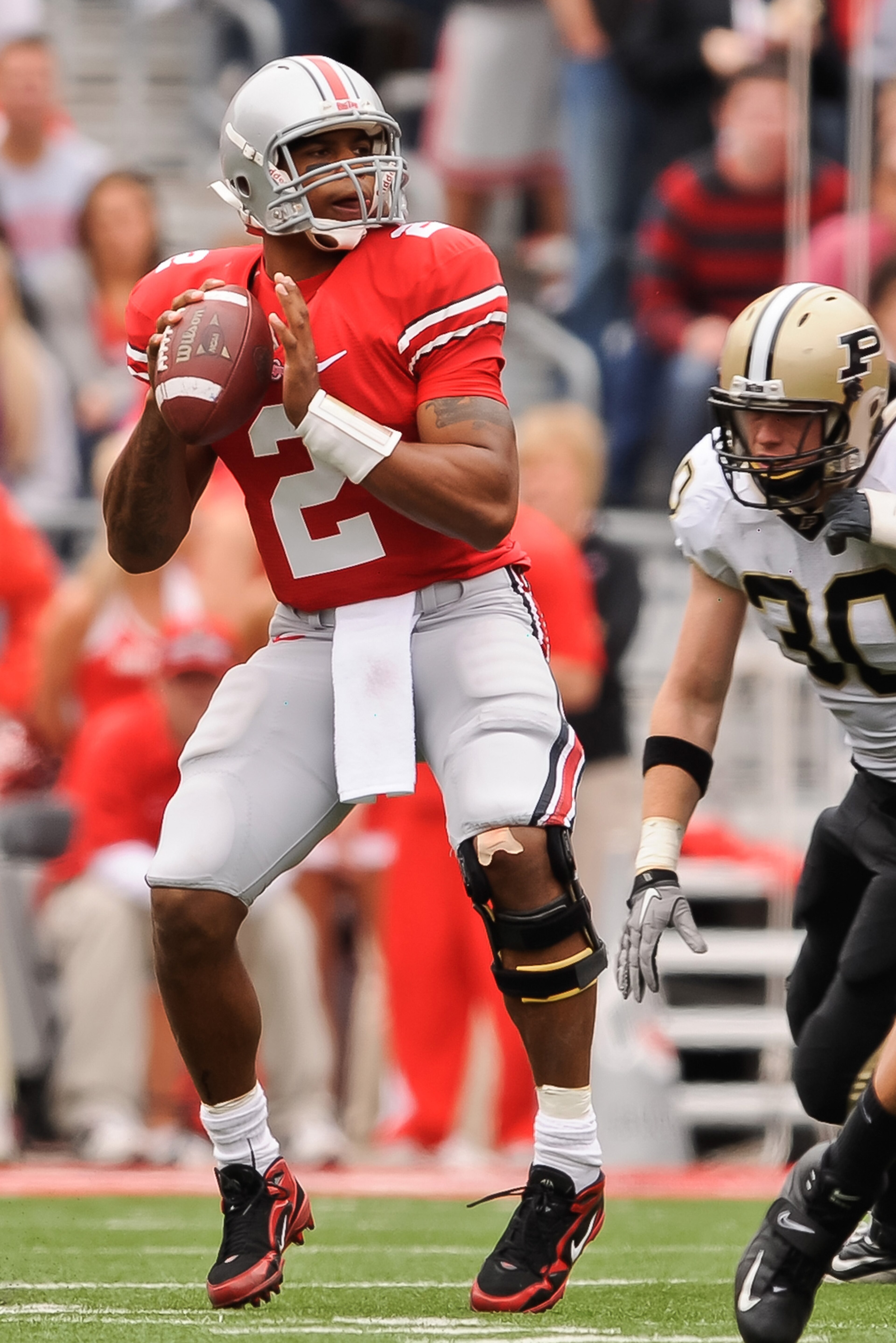 COLUMBUS, OH - OCTOBER 23:  Terrelle Pryor #2 of the Ohio State Buckeyes drops back to pass against the Purdue Boilermakers at Ohio Stadium on October 23, 2010 in Columbus, Ohio.  (Photo by Jamie Sabau/Getty Images)