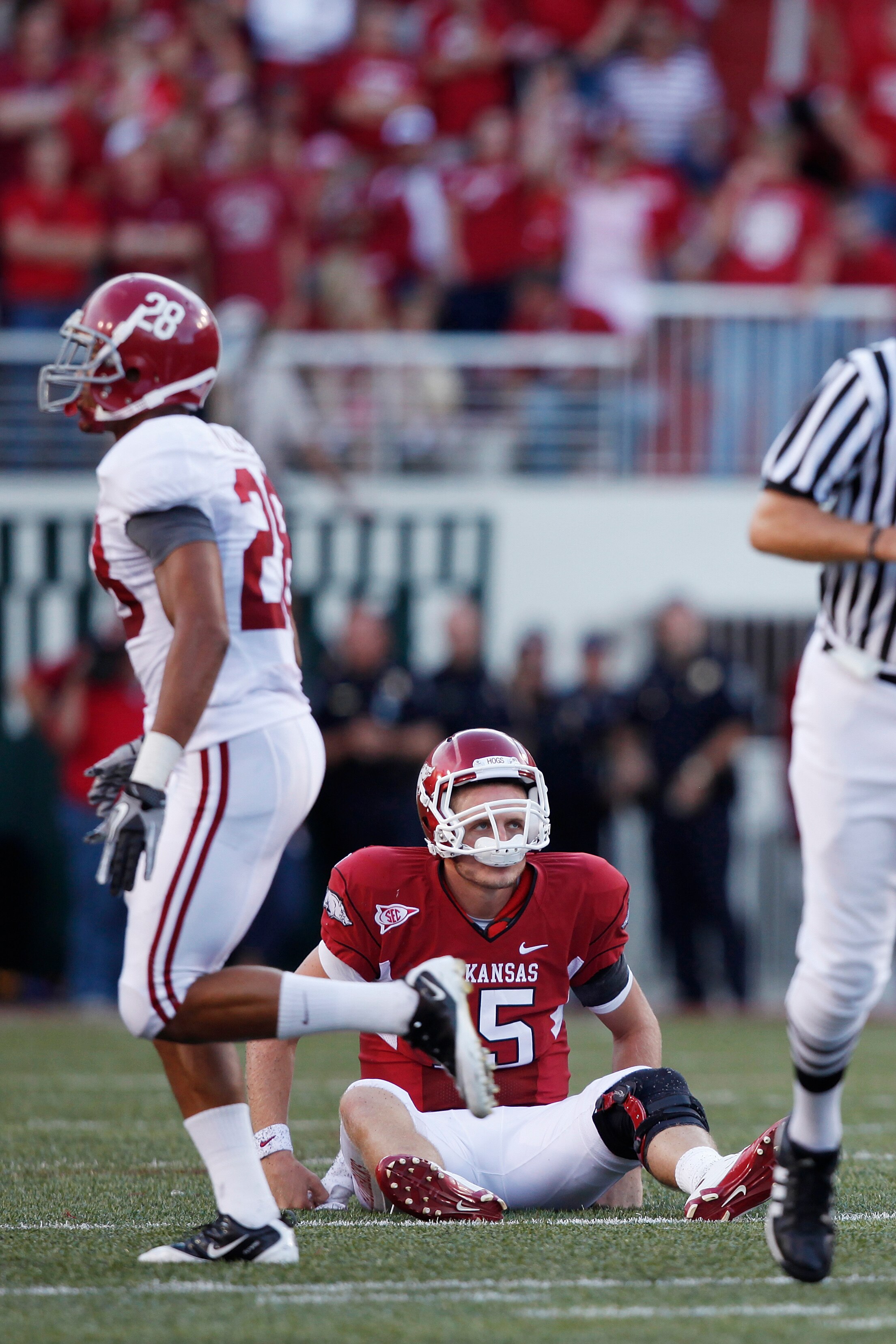 FAYETTEVILLE - SEPTEMBER 25: Ryan Mallett #15 of the Arkansas Razorbacks looks on after throwing an interception late in the game against the Alabama Crimson Tide at Donald W. Reynolds Razorback Stadium on September 25, 2010 in Fayetteville, Arkansas. Ala