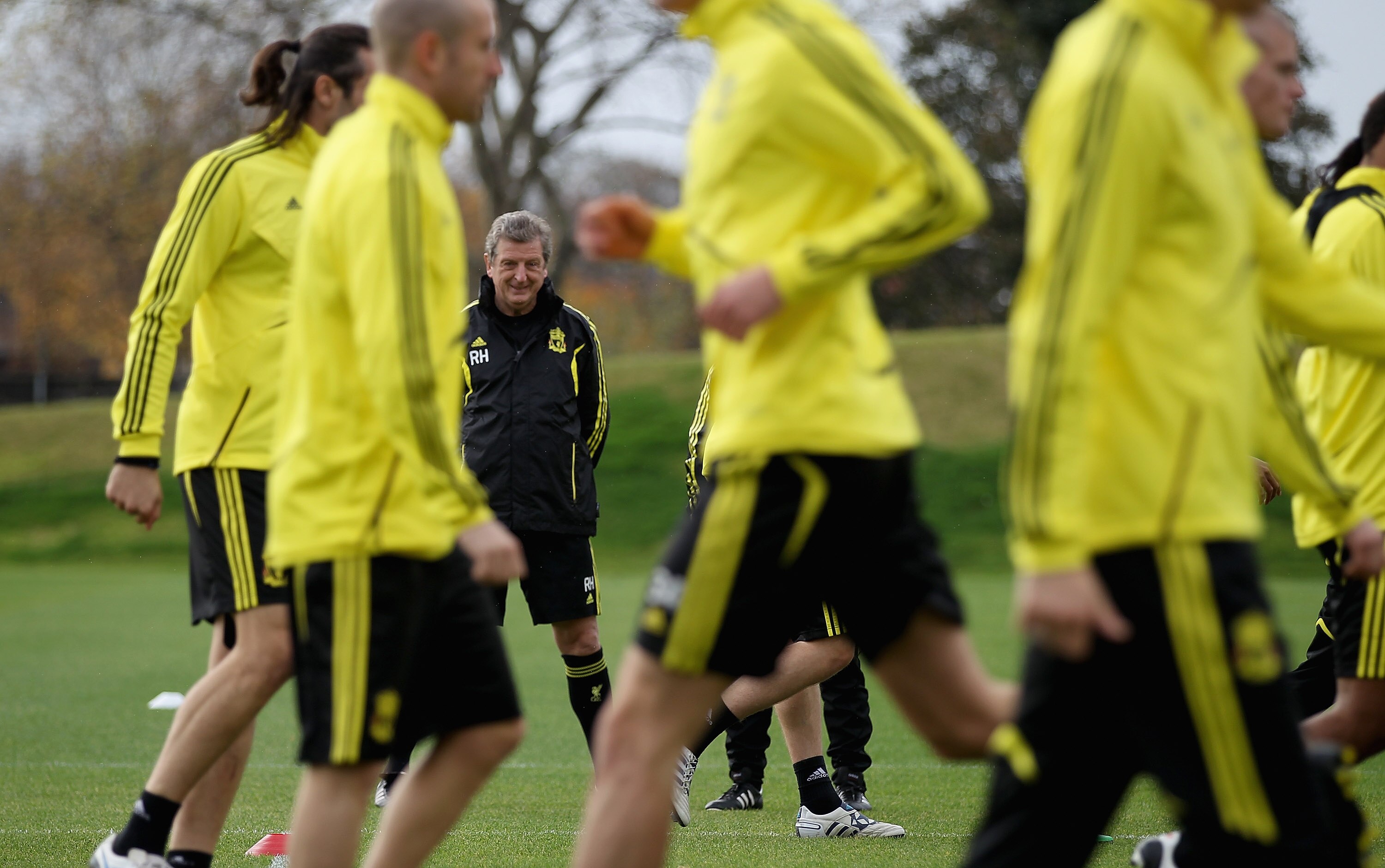 LIVERPOOL, ENGLAND - NOVEMBER 03:  Liverpool manager Roy Hodgson watches his players during a training session ahead of their UEFA Europa League match against SSC Napoli at Melwood Training Ground  on November 3, 2010 in Liverpool, England.  (Photo by Cli
