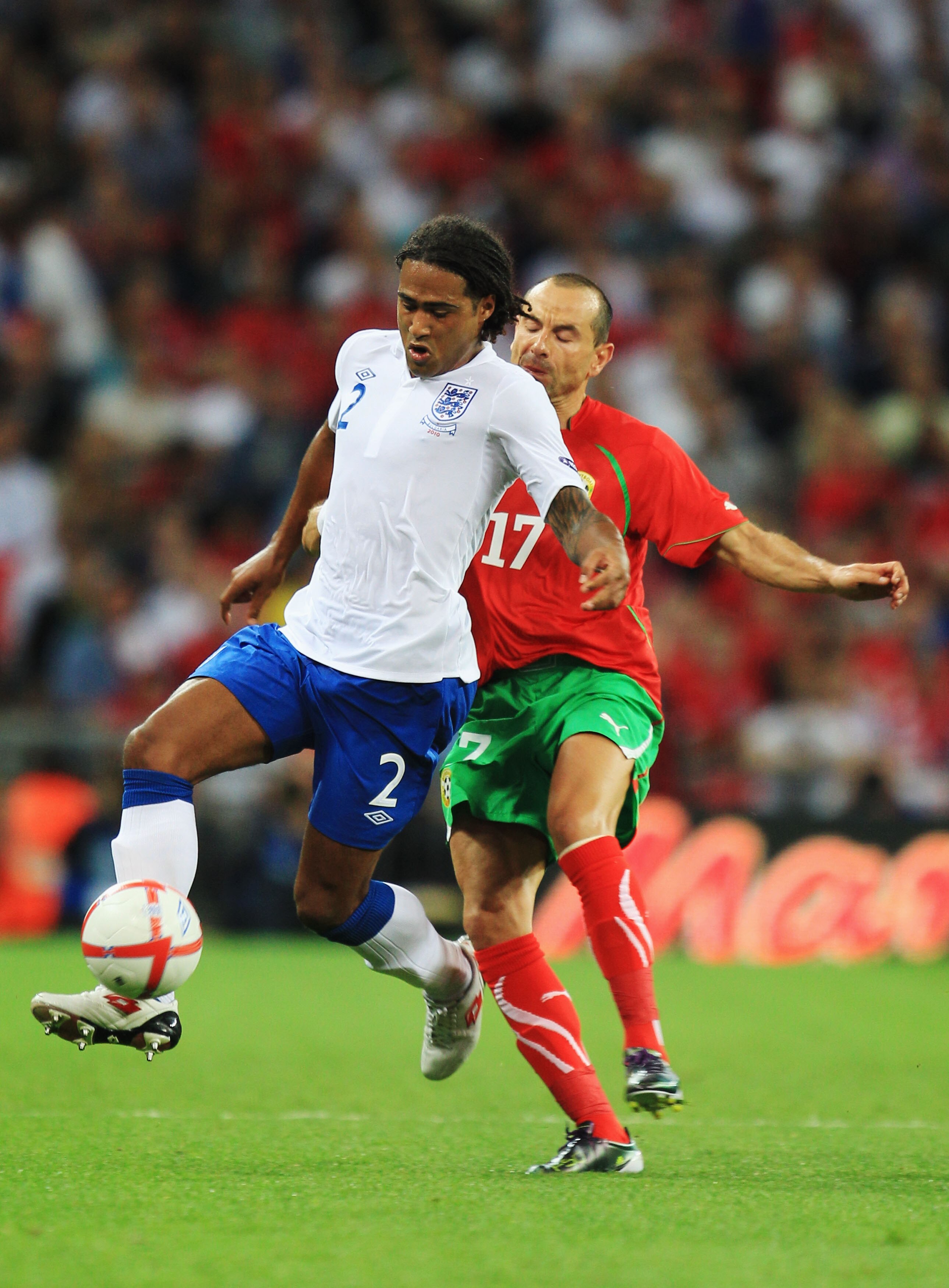 LONDON, ENGLAND - SEPTEMBER 03:  Glen Johnson (L) of England shields the ball from Martin Petrov (R) of Bulgaria during the UEFA EURO 2012 Group G Qualifying match between England and Bulgaria at Wembley Stadium on September 3, 2010 in London, England.  (