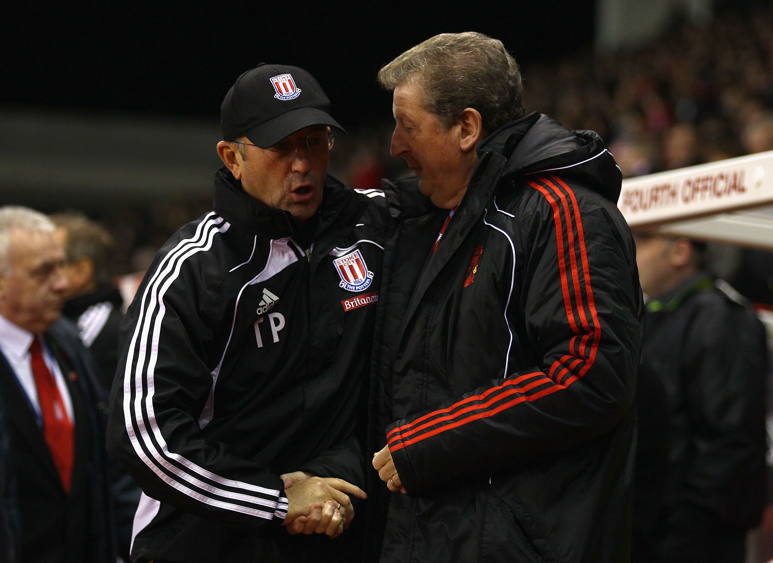 STOKE ON TRENT, ENGLAND - NOVEMBER 13:  Liverpool manager Roy Hodgson shakes hands with Stoke City manager Tony Pulis before the start of the  Barclays Premier League match between Stoke City and Liverpool at Britannia Stadium on November 13, 2010 in Stok