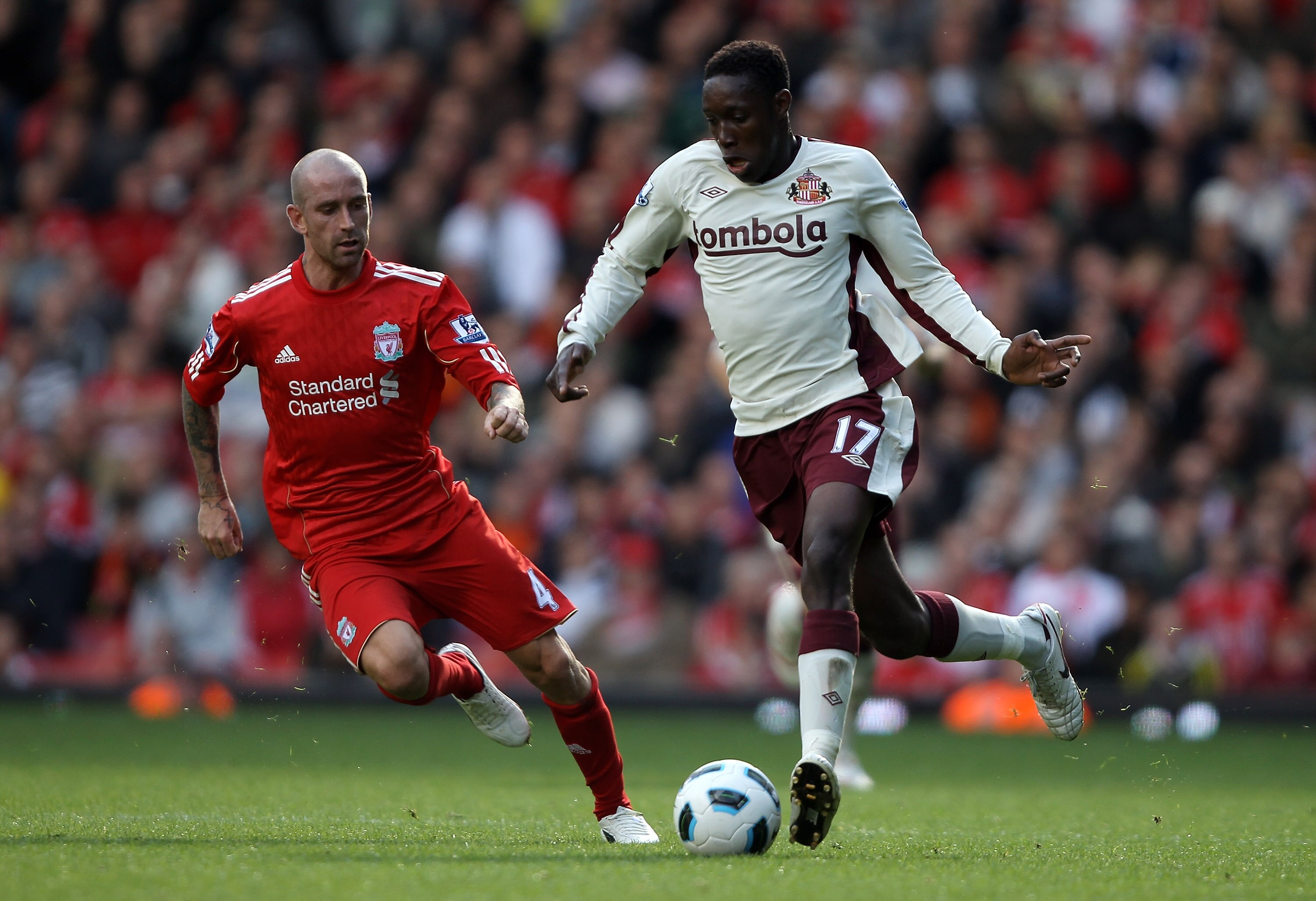LIVERPOOL, ENGLAND - SEPTEMBER 25:  Danny Welbeck of Sunderland moves away from Raul Meireles of Liverpool during the Barclays Premier League match between Liverpool and Sunderland at at Anfield on September 25, 2010 in Liverpool, England.  (Photo by Cliv