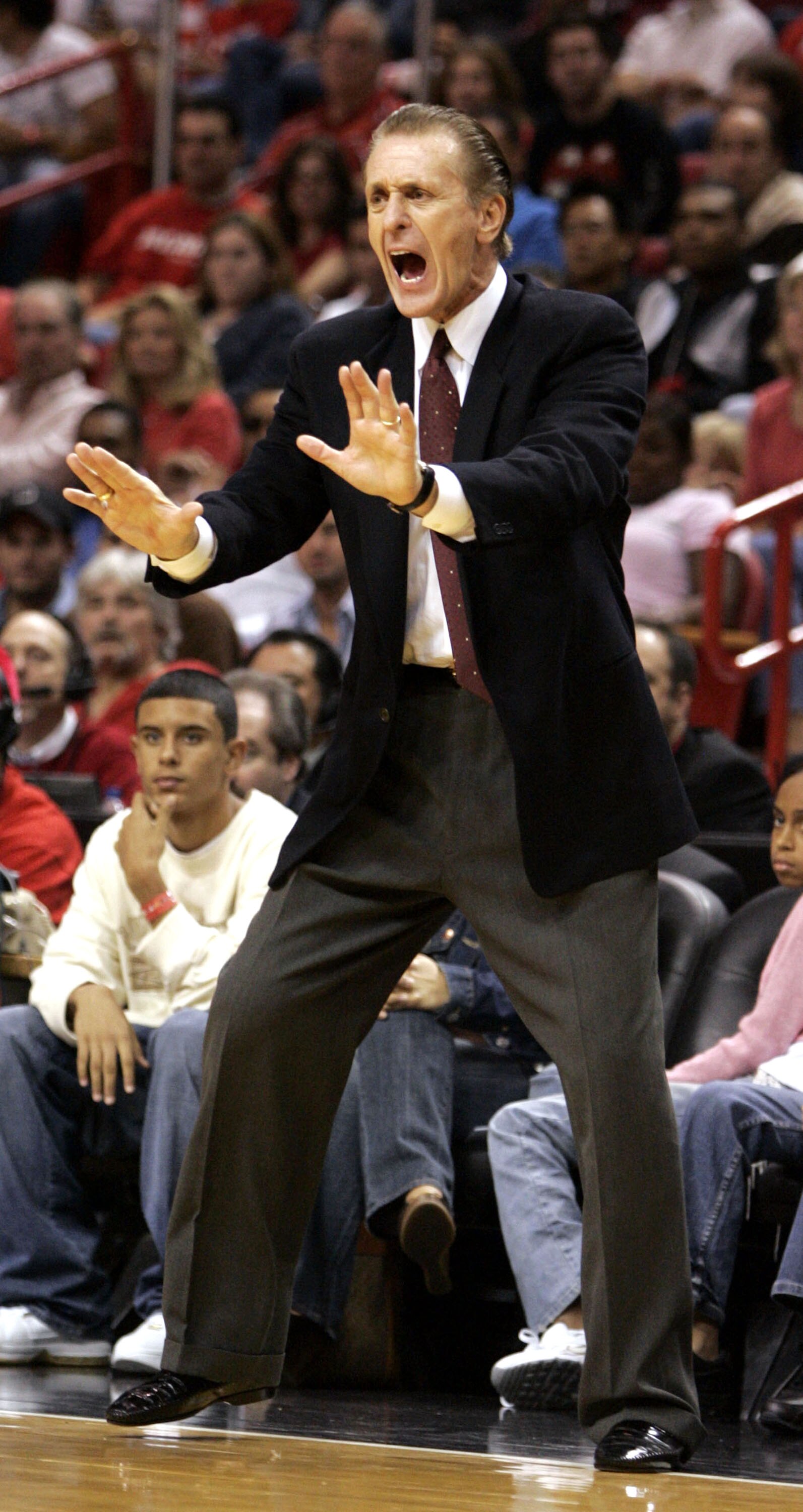 MIAMI - DECEMBER 25:  Head Coach Pat Riley of the Miami Heat directs his team against the Los Angeles Lakers on December 25, 2005 at the American Airlines Arena in Miami, Florida.  NOTE TO USER: User expressly acknowledges and agrees that, by downloading