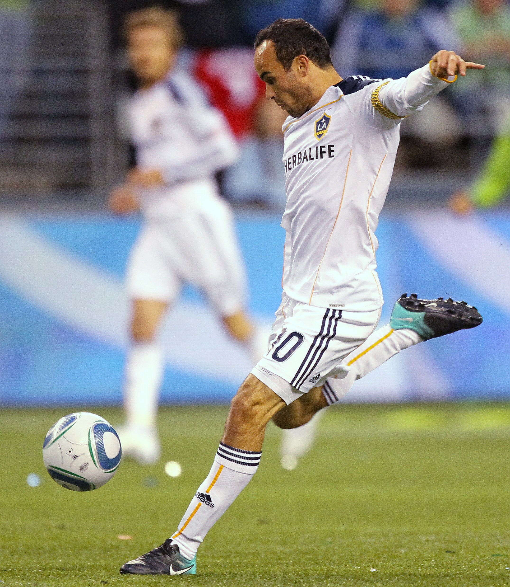 SEATTLE, WA - OCTOBER 31:  Landon Donovan #10 of the Los Angeles Galaxy shoots against the Seattle Sounders FC during the 1st leg playoff game at Qwest Field on October 31, 2010 in Seattle, Washington. (Photo by Otto Greule Jr/Getty Images)