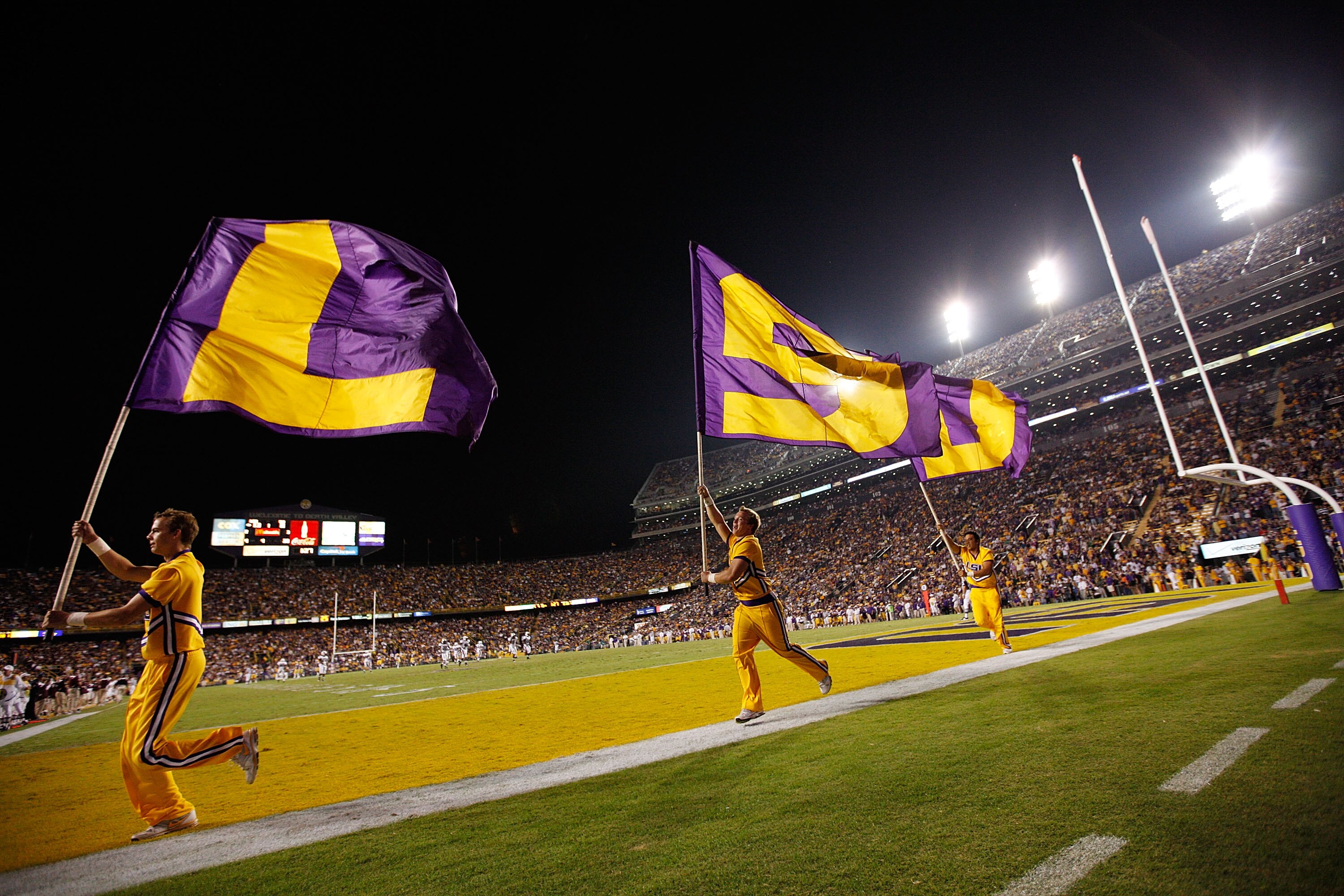 BATON ROUGE, LA - NOVEMBER 13:  Members of the Louisiana State University Tigers cheerleaders celebrate after a touchdown during the game against the University of Louisiana-Monroe Warhawks at Tiger Stadium on November 13, 2010 in Baton Rouge, Louisiana.