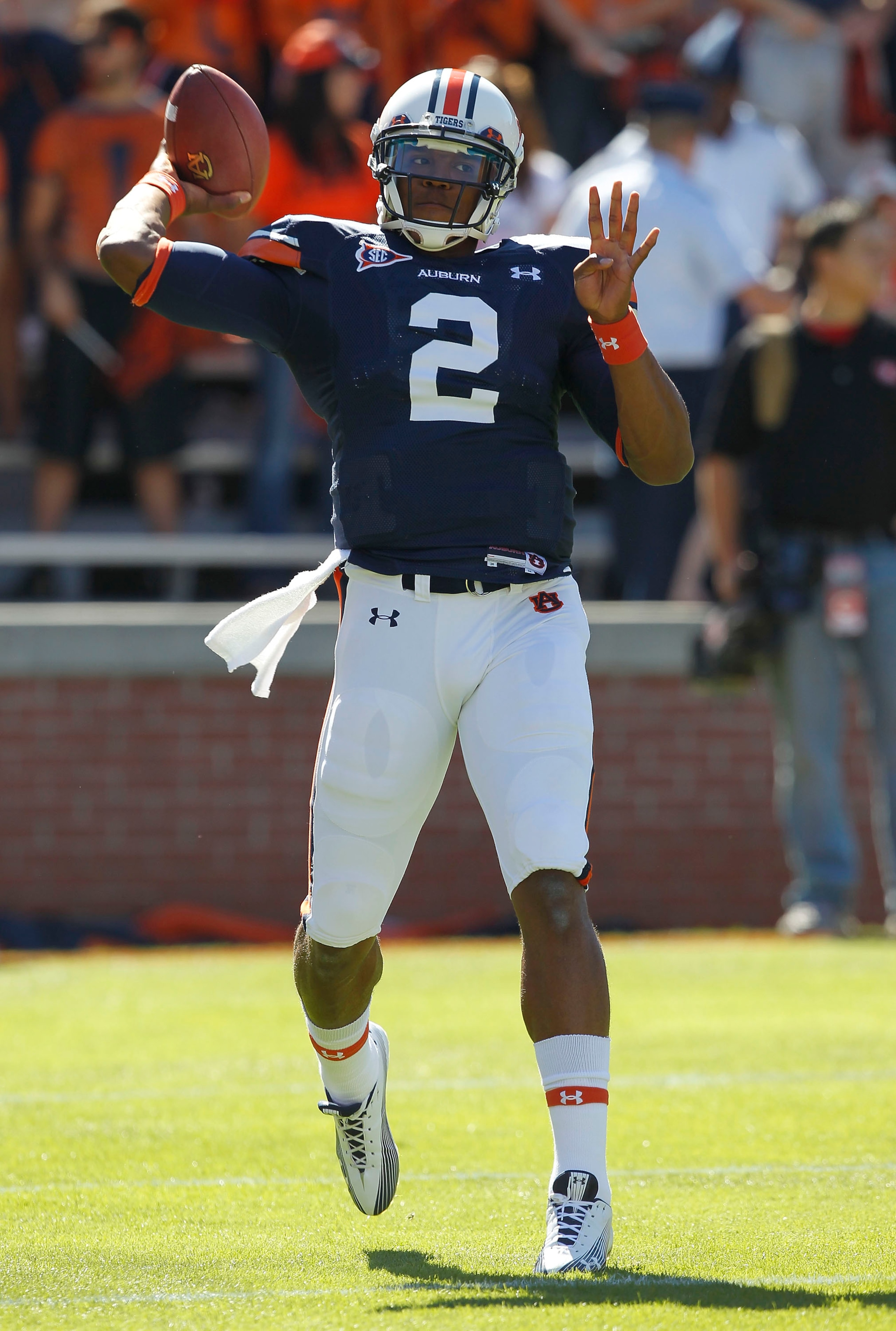 AUBURN, AL - OCTOBER 16:  Quarterback Cam Newton #2 of the Auburn Tigers throws a practice pass before the game against the Arkansas Razorbacks at Jordan-Hare Stadium on October 16, 2010 in Auburn, Alabama.  (Photo by Mike Zarrilli/Getty Images)