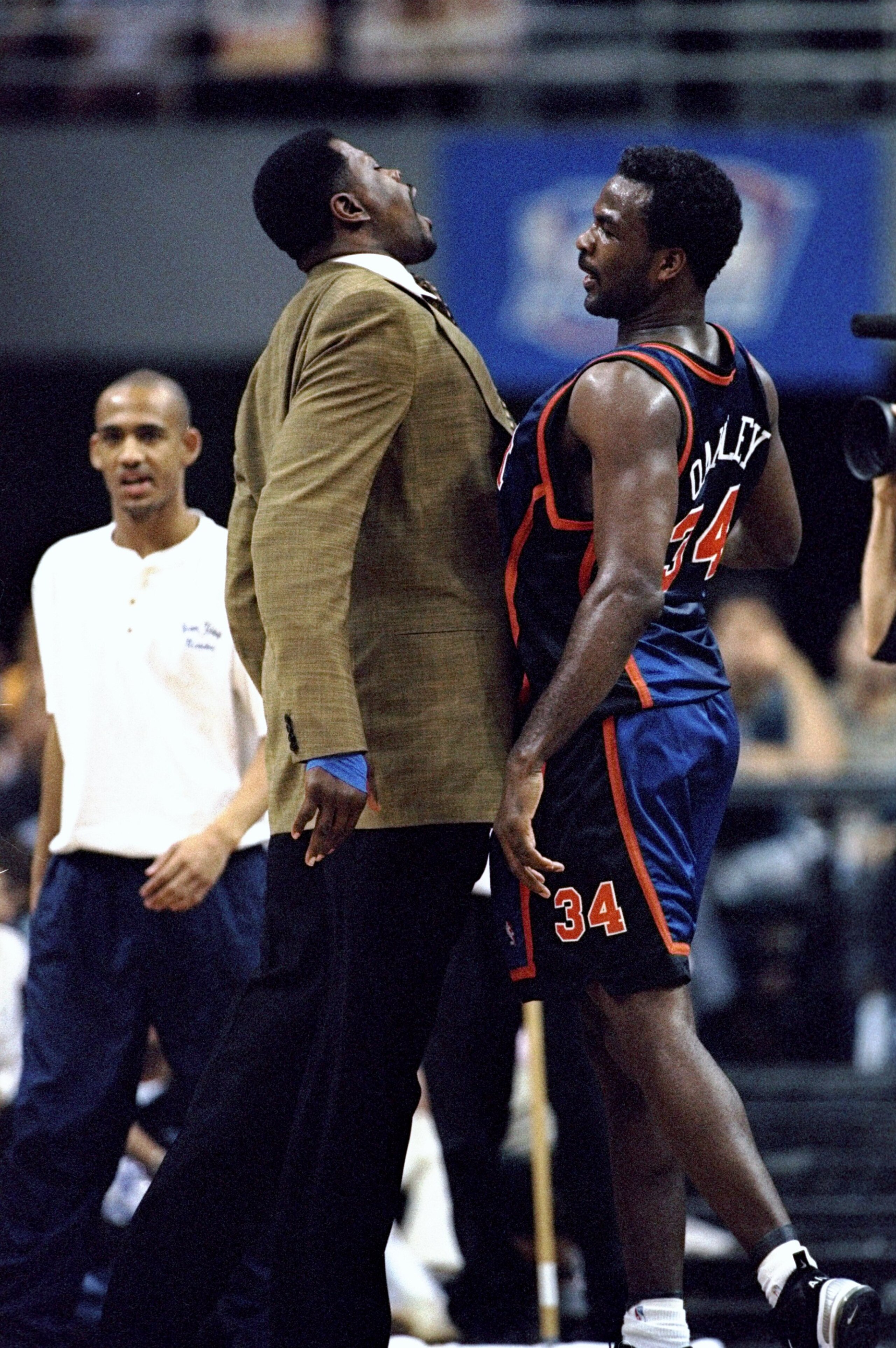 3 May 1998:  Patrick Ewing #33 and Charles Oakley #34 of the New York Knicks celebrate by bumping chests during game five, of the first round of the Eastern Conference Playoffs against the Miami Heat at the Miami Arena in Miami, Florida. The Knicks defeat