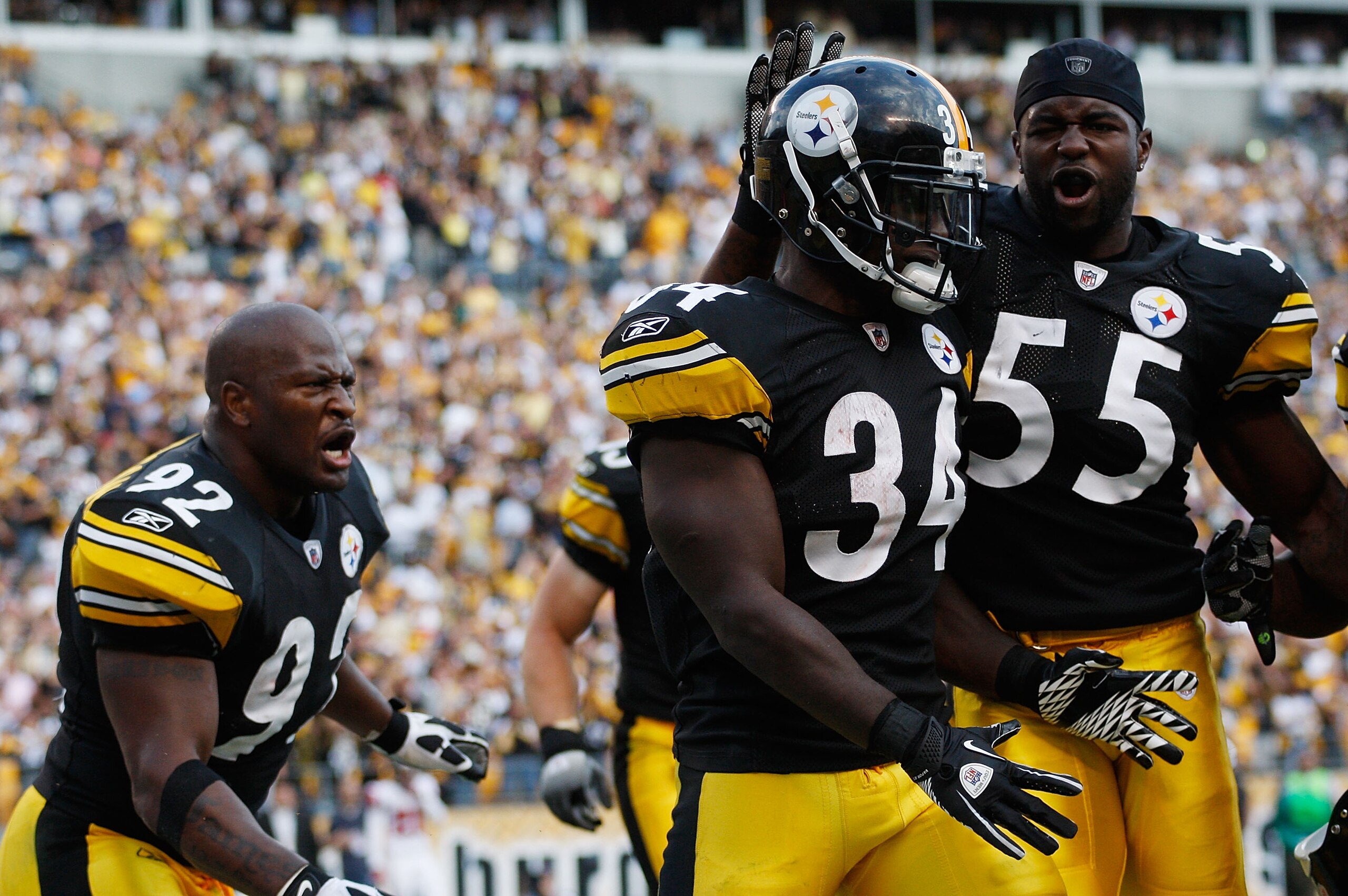 PITTSBURGH - SEPTEMBER 12: Rashard Mendenhall #34 of the Pittsburgh Steelers celebrates with teammates Stevenson Sylvester #55 and James Harrison #92 after scoring the game winning touchdown on a 50-yard run against the Atlanta Falcons during the NFL sea PITTSBURGH - SEPTEMBER 12: Rashard Mendenhall #34 of the Pittsburgh Steelers celebrates with teammates Stevenson Sylvester #55 and James Harrison #92 after scoring the game winning touchdown on a 50-yard run against the Atlanta Falcons during the NFL sea