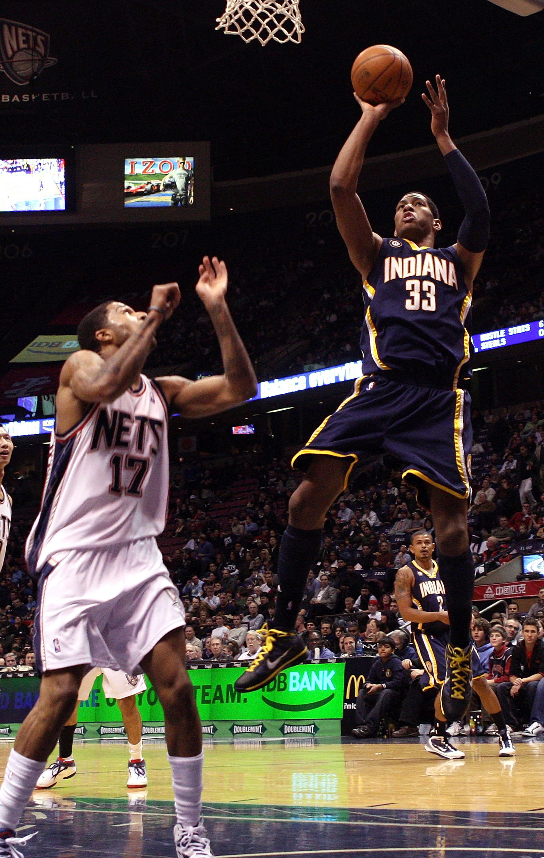 EAST RUTHERFORD, NJ - JANUARY 15:  Danny Granger #33 of the Indiana Pacers shoots over Chris Douglas-Roberts #17 of the New Jersey Nets at the Izod Center on January 15, 2010 in East Rutherford, New Jersey. NOTE TO USER: User expressly acknowledges and ag