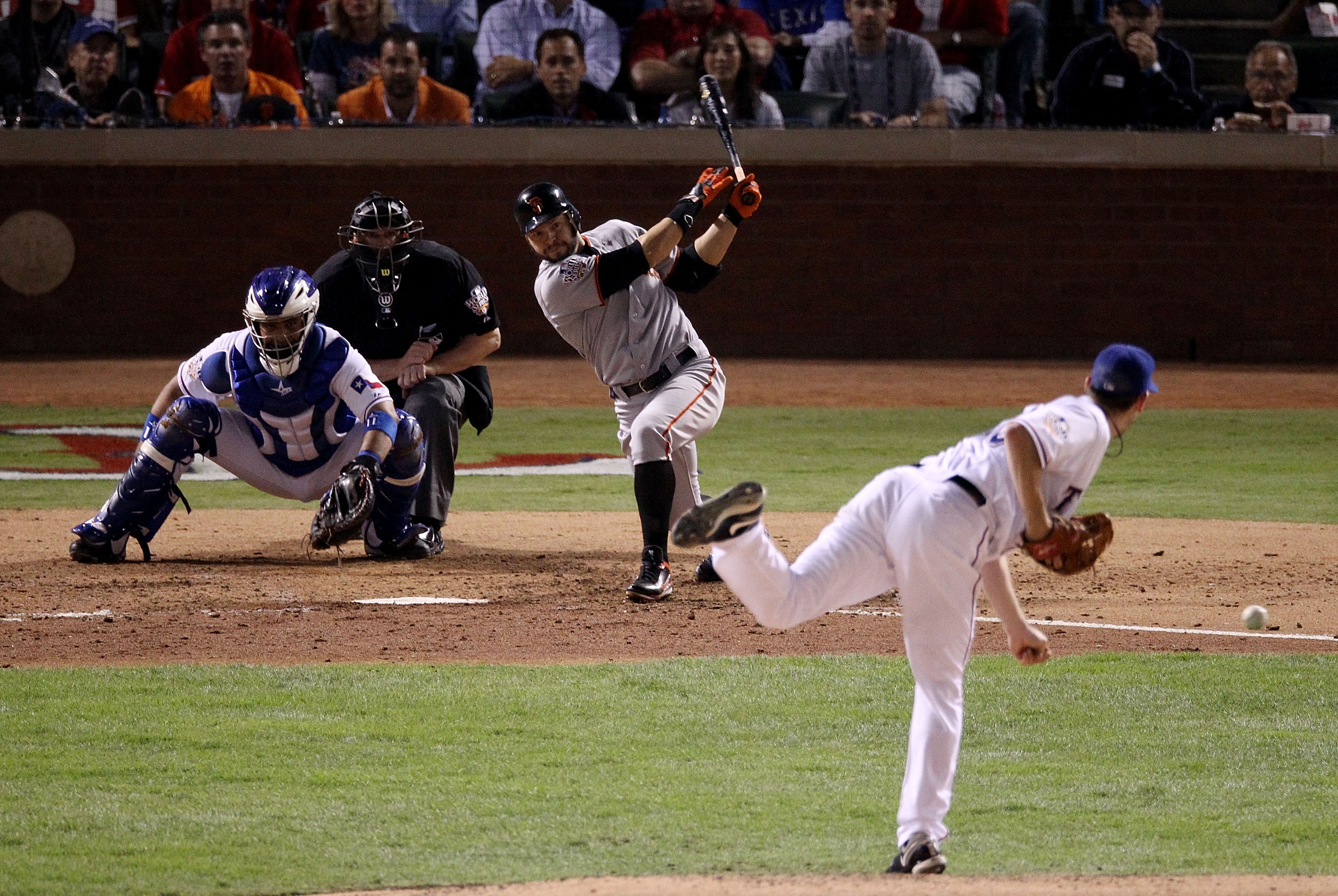 ARLINGTON, TX - NOVEMBER 01:  Cody Ross #13 of the San Francisco Giants hits a single against starting pitcher Cliff Lee #33 of the Texas Rangers in the seventh inning of Game Five of the 2010 MLB World Series at Rangers Ballpark in Arlington on November 